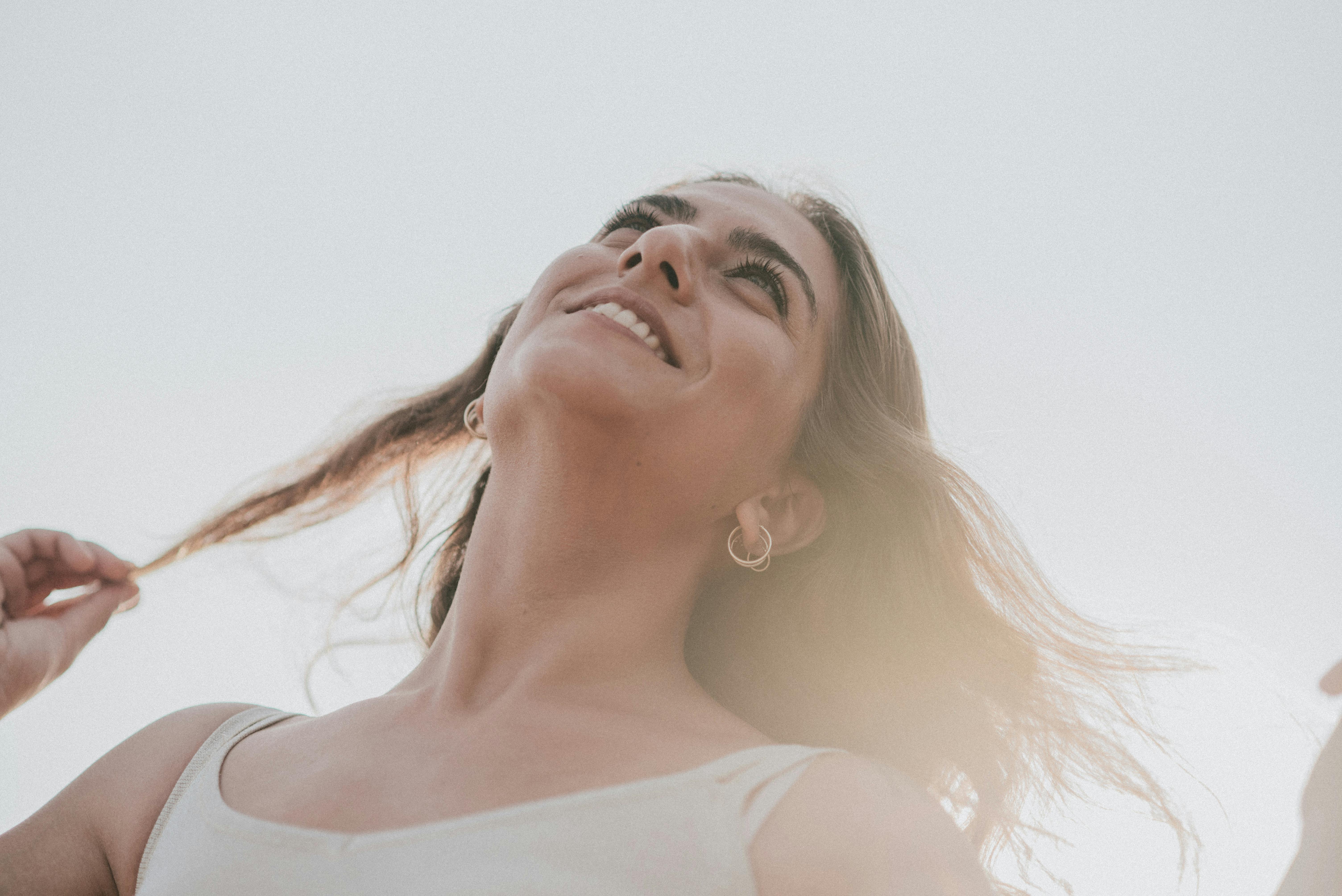 A happy woman outside | Source: Pexels