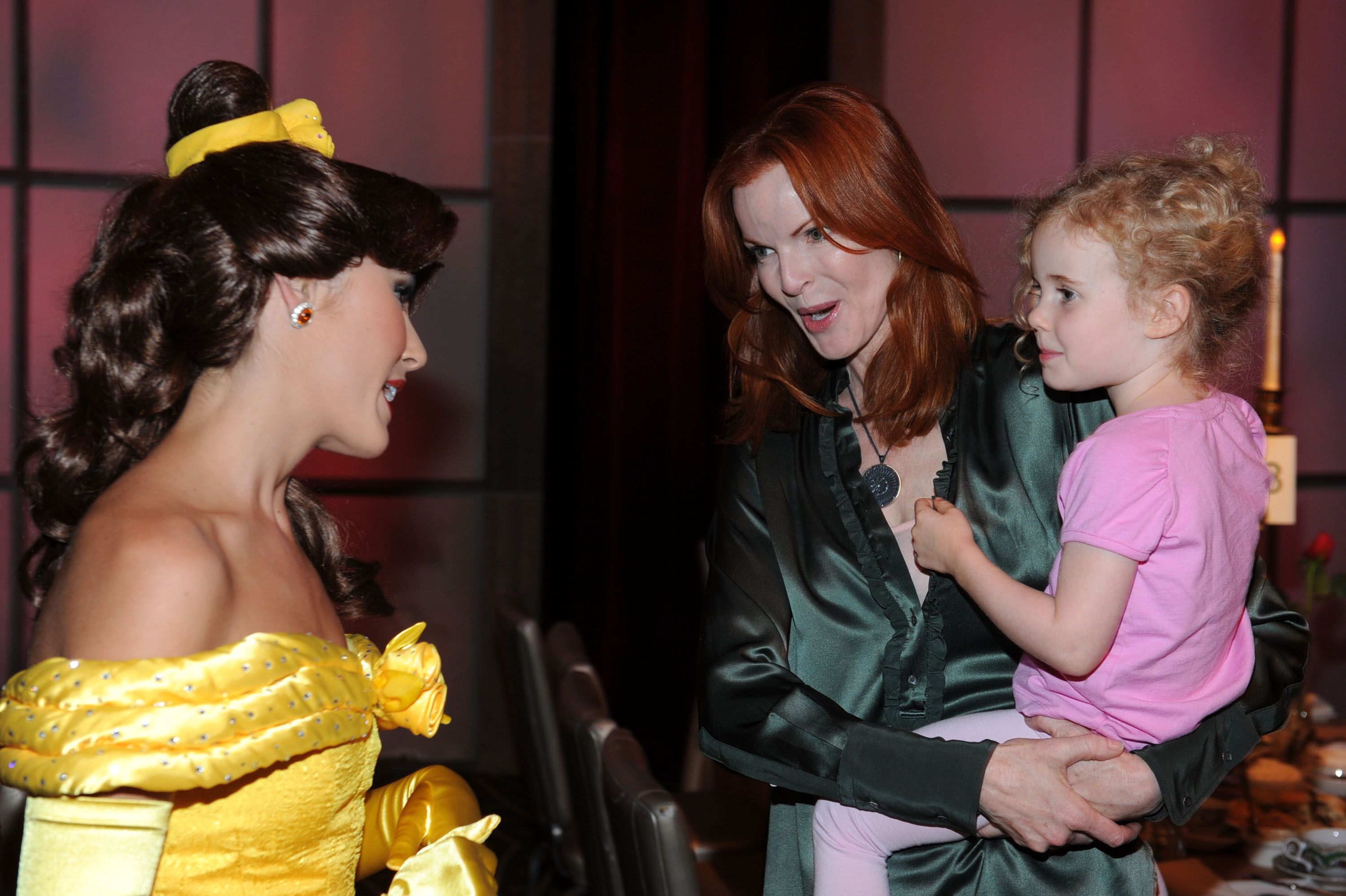 Marcia Cross and daughter Eden Mahoney attend the "Beauty and the Beast" Sing-A-Long DVD premiere after Tea Party held at the Hollywood and Highland Ballroom on October 2, 2010 in Los Angeles, California. | Source: Getty Images