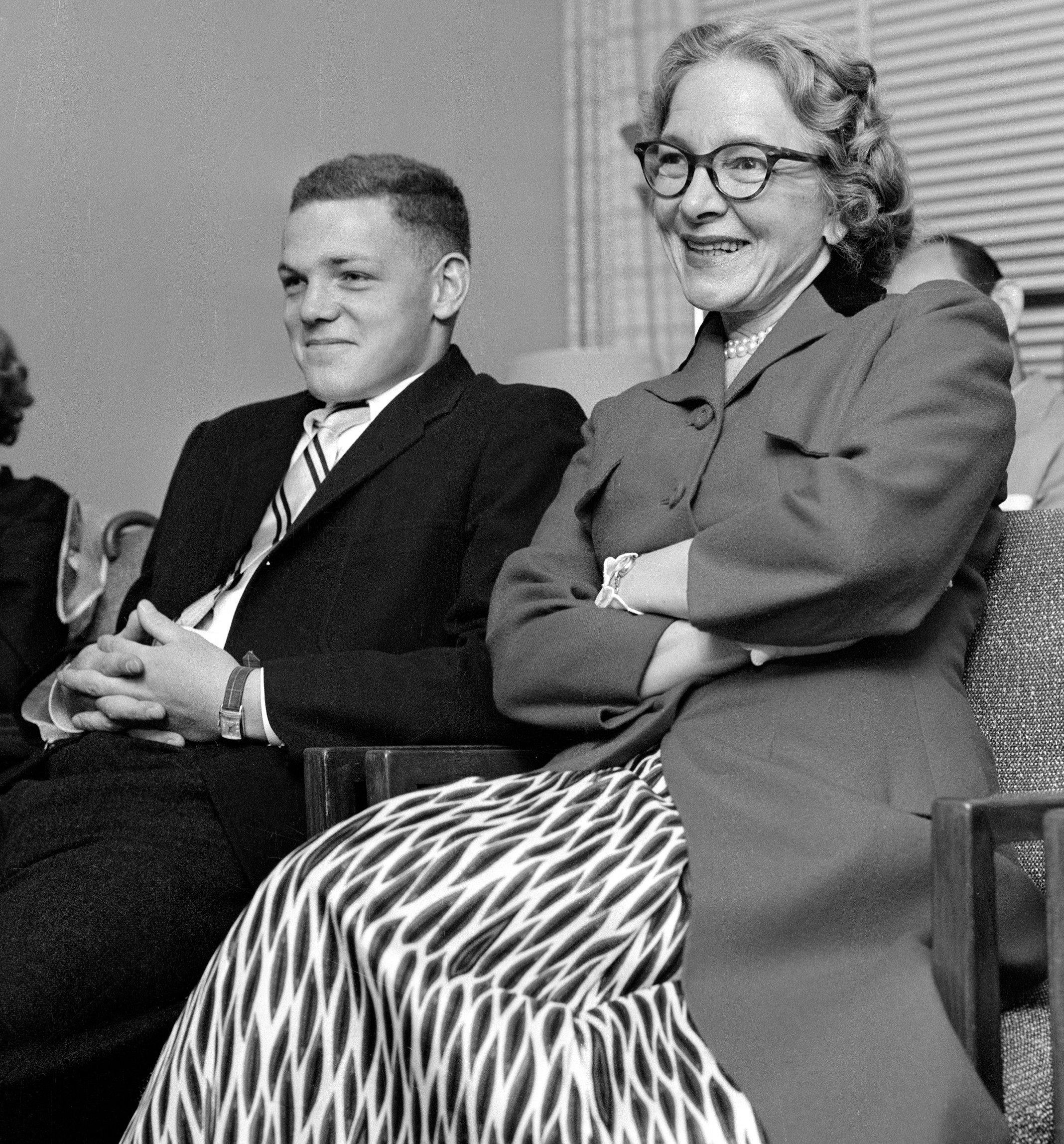 Helen Hayes and James MacArthur sitting together on January 1, 1955 | Source: Getty Images