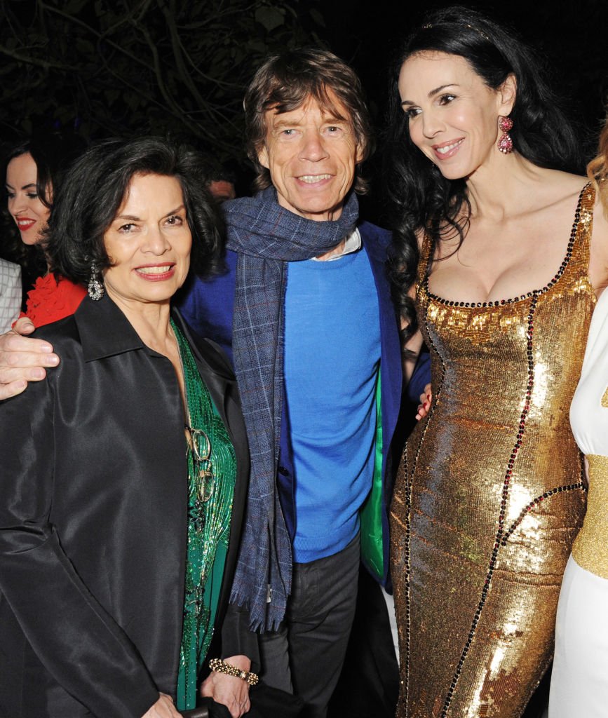 Bianca Jagger, Mick Jagger and L'Wren Scott at the annual Serpentine Gallery Summer Party on June 26, 2013 in London, England | Photo by Dave M. Benett/Getty Images