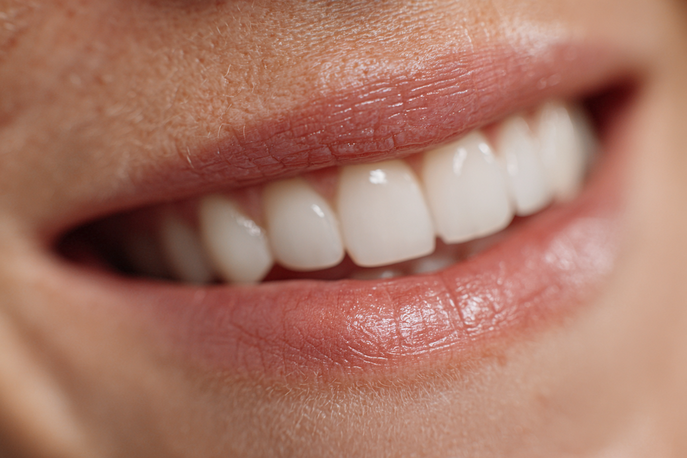 A woman's smile | Source: Midjourney