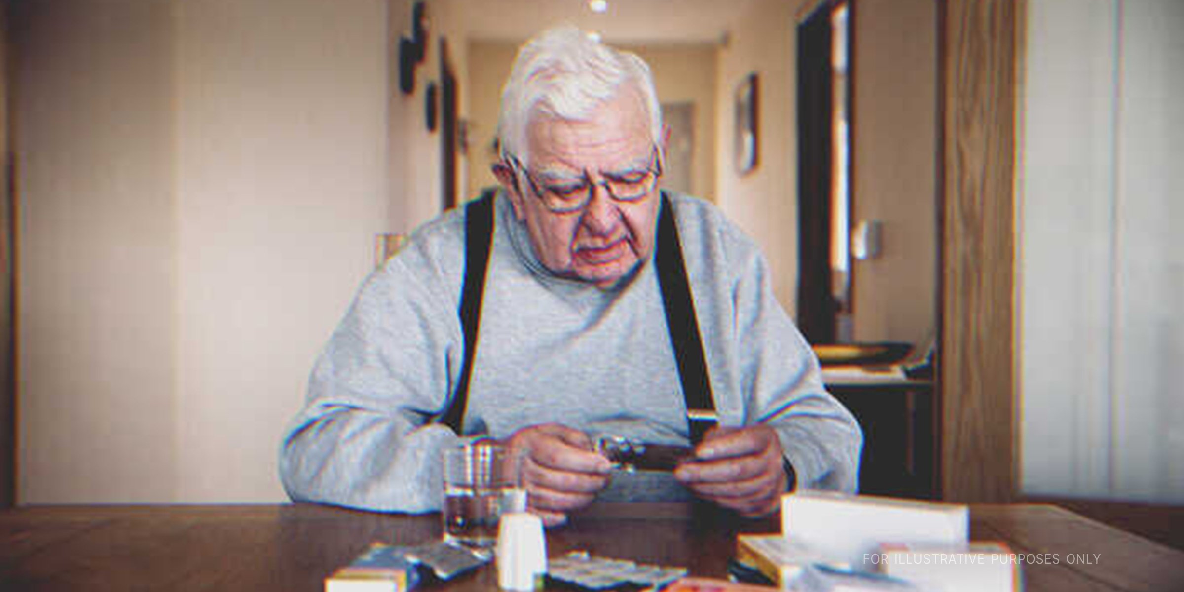 Elderly man looking at his medication | Source: Getty Images