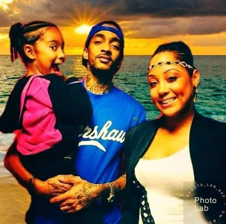 Screenshot of a throwback photo of Nipsey Hussle & Tanisha Foster with their daughter Emani. |Photo: Instagram/Tanisha Foster(@chynahussle)