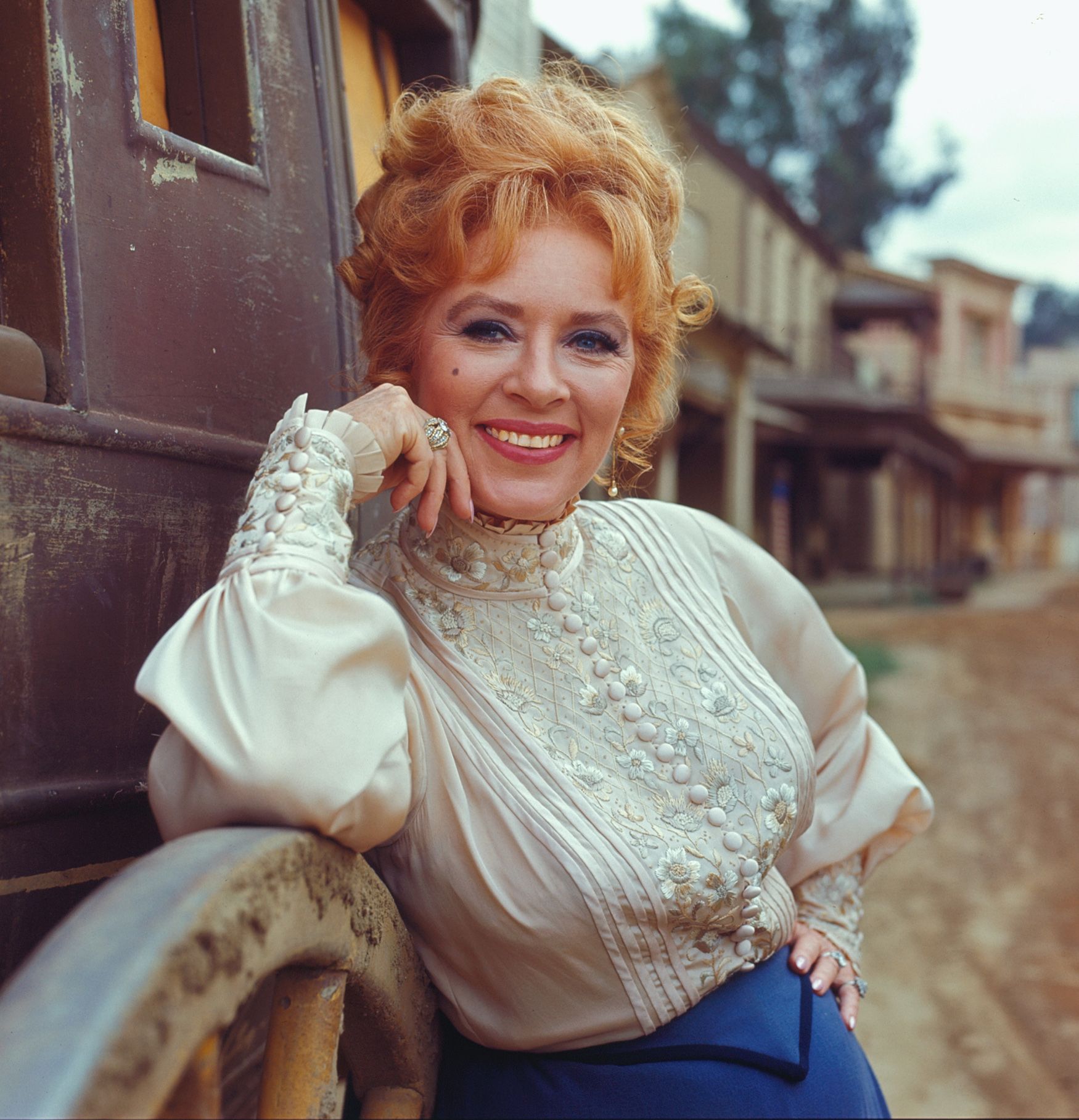 Amanda Blake in costume as Kitty Russell, on the set of 'Gunsmoke&apos...