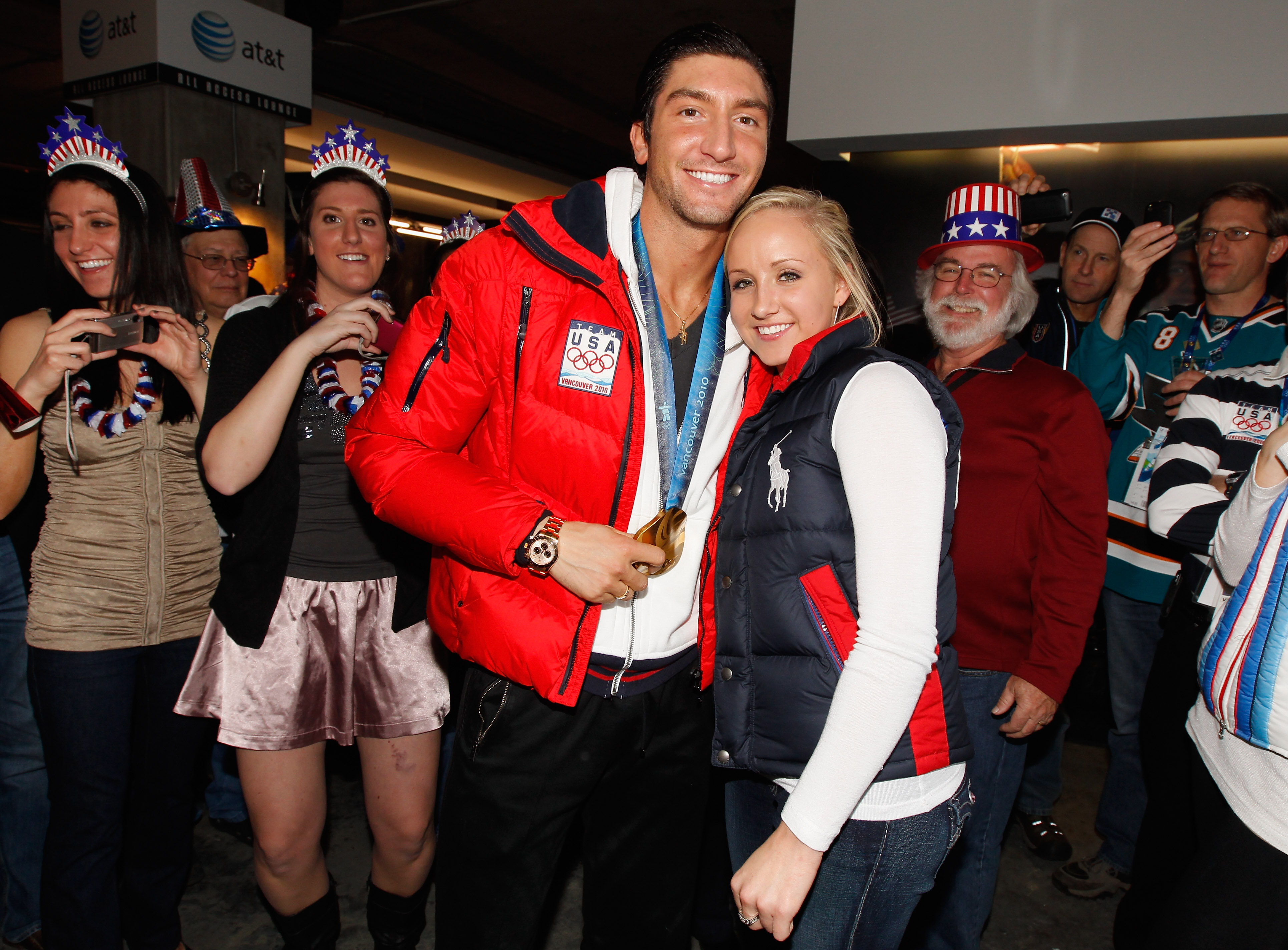 Evan Lysacek shares his men's figure skating Olympic gold medal with Nastia Liukin at the USA House on February 18, 2010, in Vancouver, Canada. | Source: Getty Images