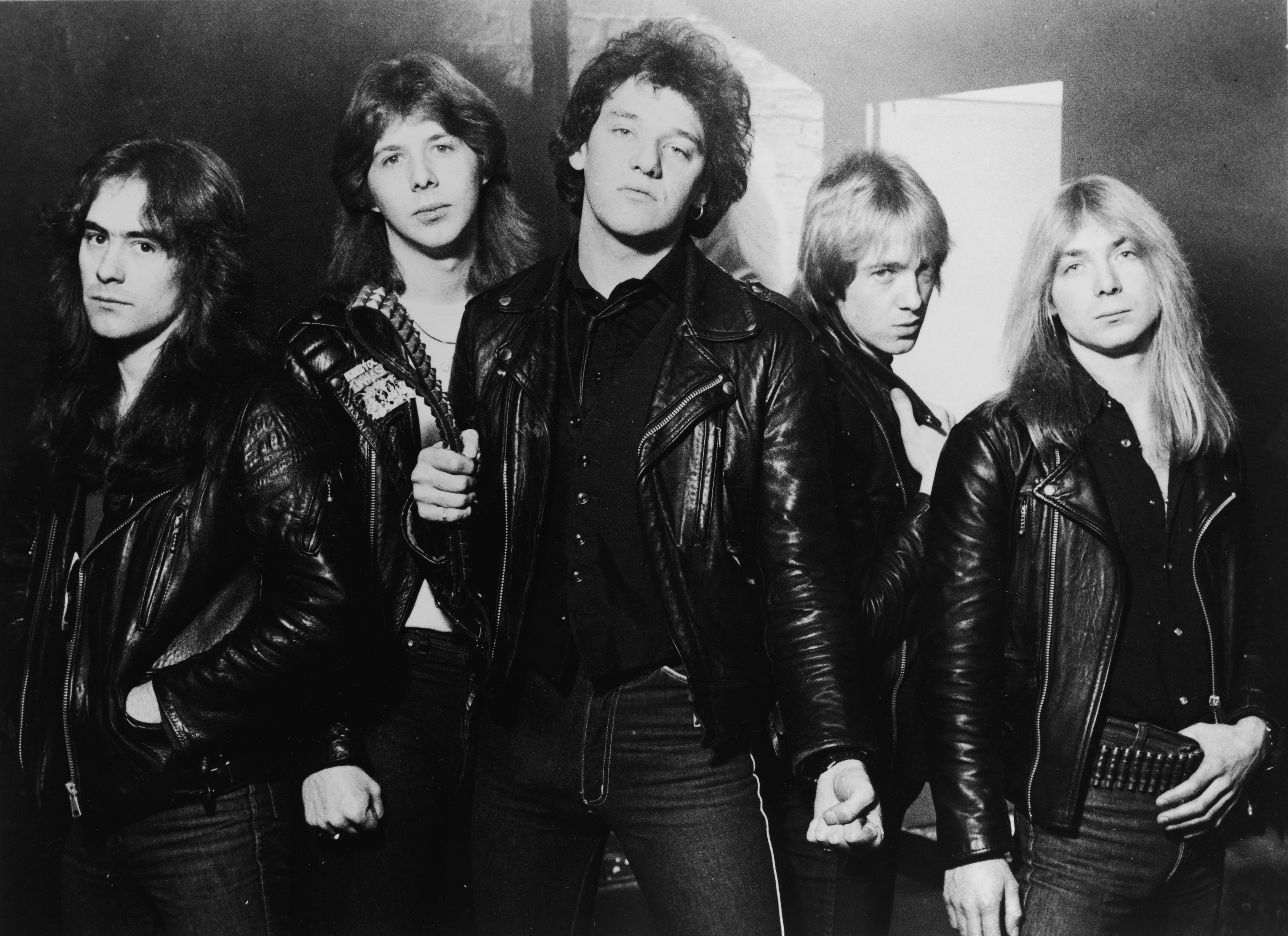 Steve Harris, Clive Burr, Paul Di'Anno, Adrian Smith, and Dave Murray in an Iron Maiden promotional portrait in 1981 | Source: Getty Images