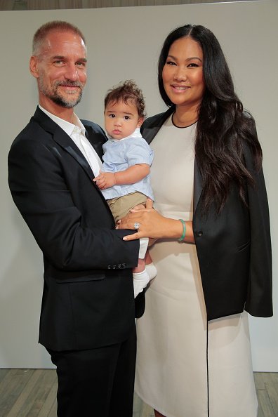Tim Leissner and Kimora Lee Simmons Leissner with their son Wolfe attend the Kimora Lee Simmons Presentation Spring | Photo: Getty Images