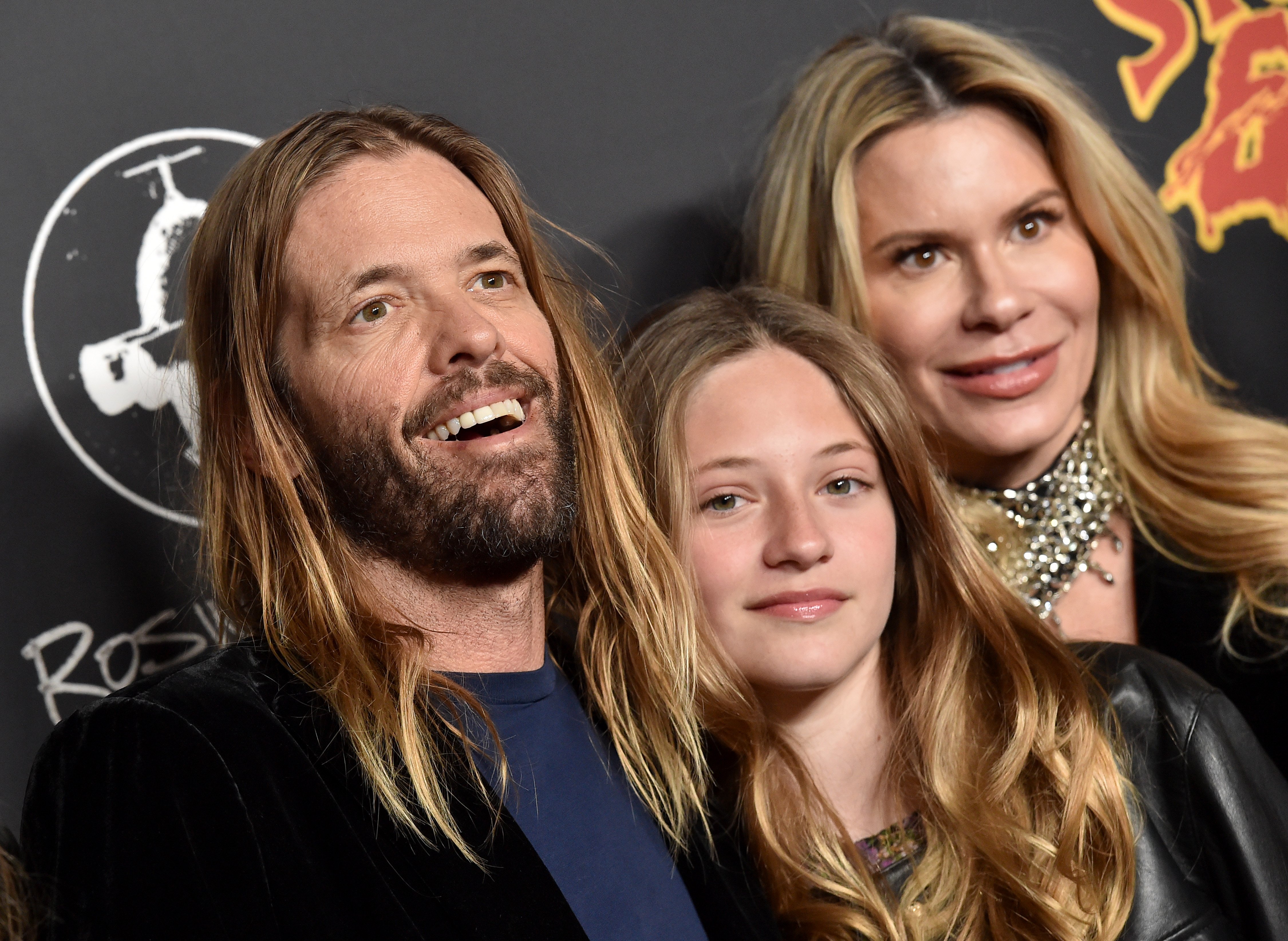 (L-R) Taylor Hawkins, Annabelle Hawkins and Alison Hawkins are pictured at the Los Angeles Premiere of "Studio 666" at TCL Chinese Theatre on February 16, 2022, in Hollywood, California | Source: Getty Images