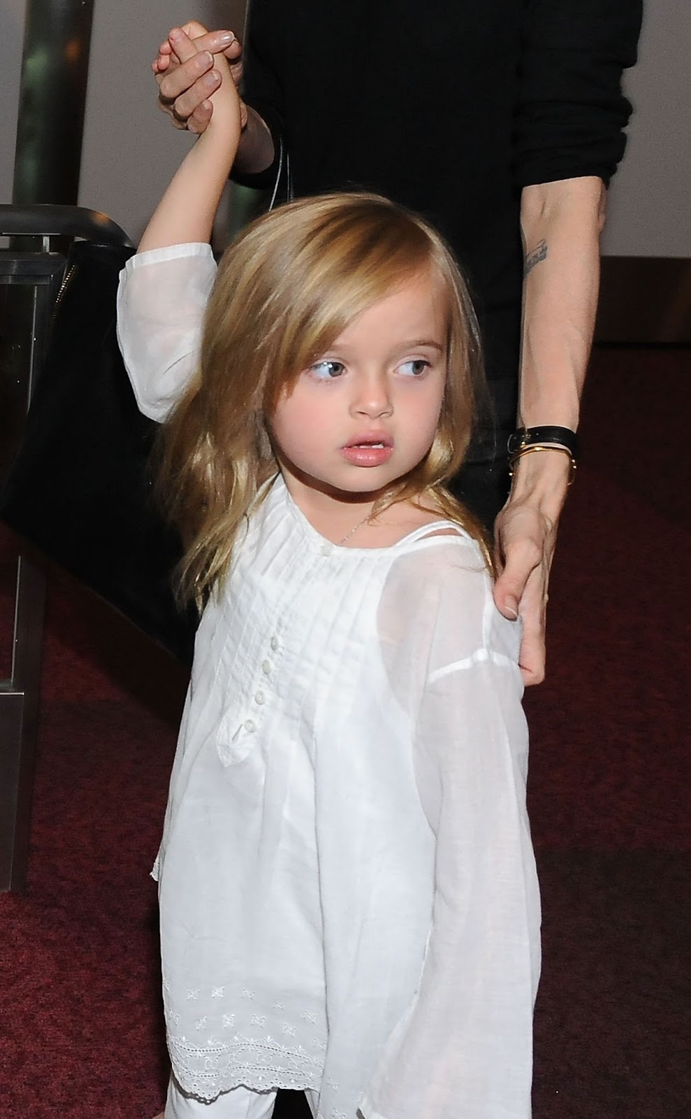 Vivienne Jolie-Pitt photographed at Tokyo International Airport on July 28, 2013, in Japan. | Source: Getty Images