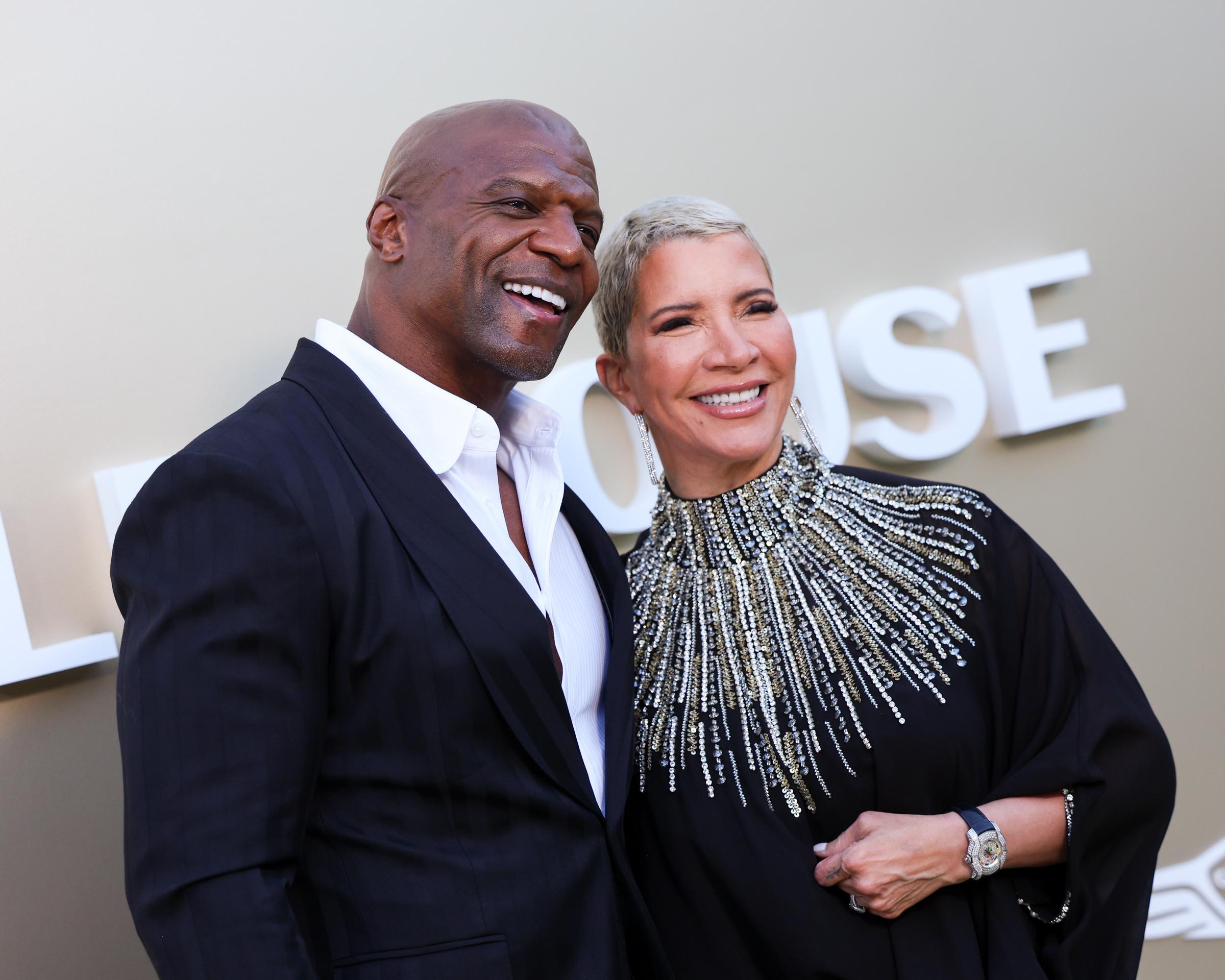 Terry Crews and Rebecca King-Crews pose together at the Gold House 5th Annual Gold Gala on May 9, 2026 | Source: Getty Images