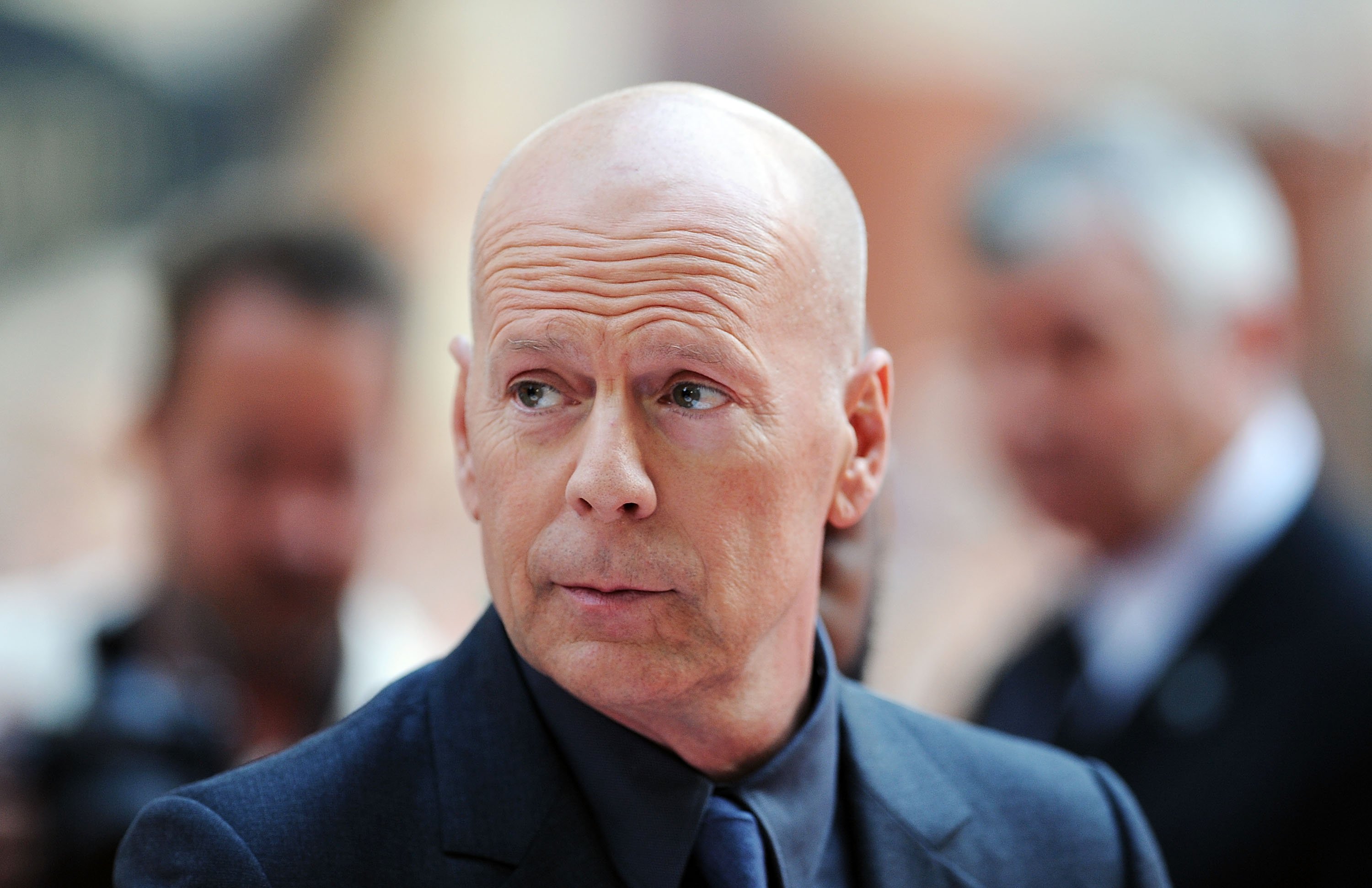 Bruce Willis attends the European Premiere of 'Red 2' on July 22, 2013, in London, England. | Source: Getty Images.