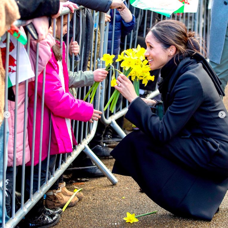 Meghan Markle engaging with children at an event posted on March 1, 2020 | Source: Instagram/sussexroyal