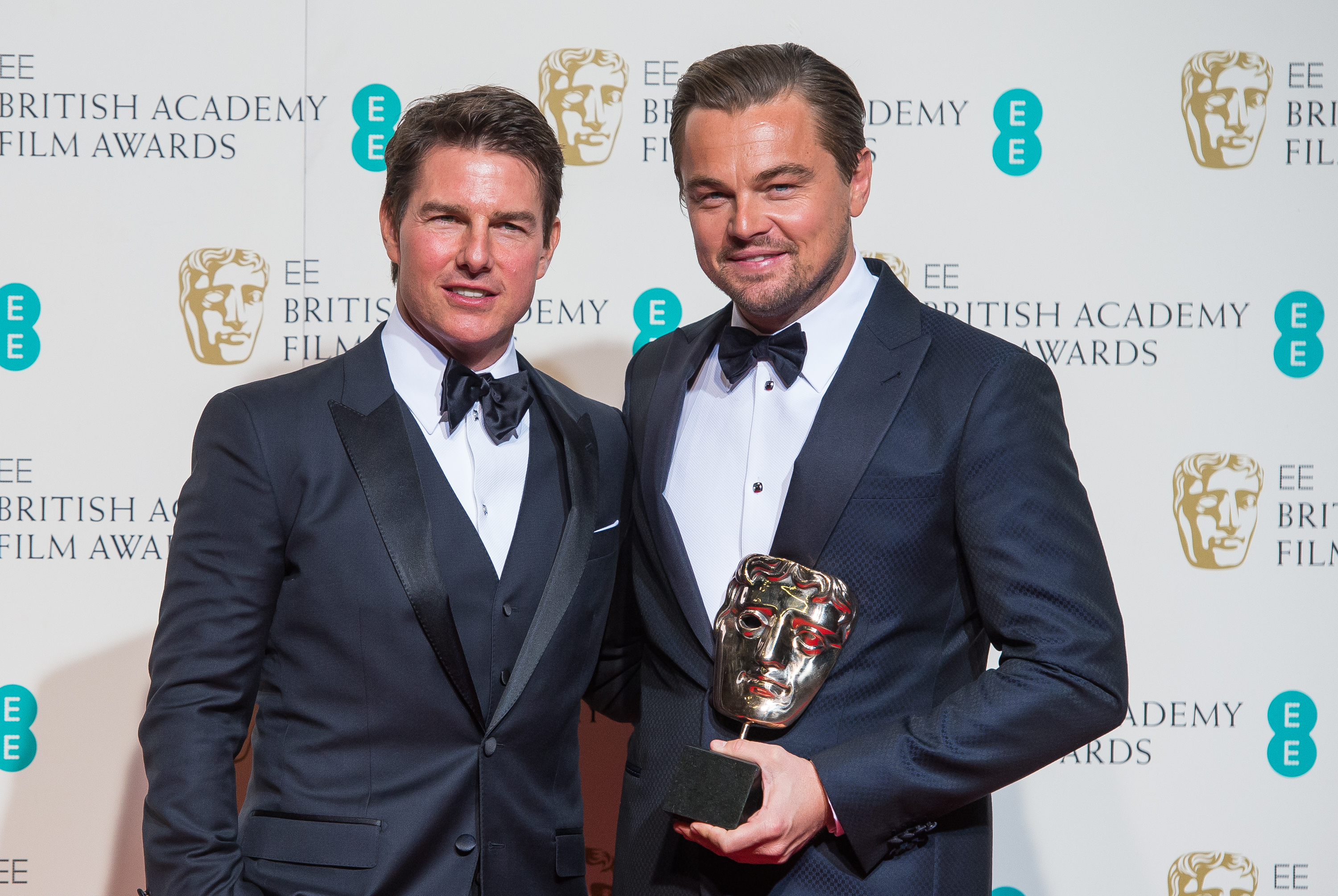 Tom Cruise and Leonardo DiCaprio at the EE British Academy Film Awards in London, England on February 14, 2016. | Source: Getty Images