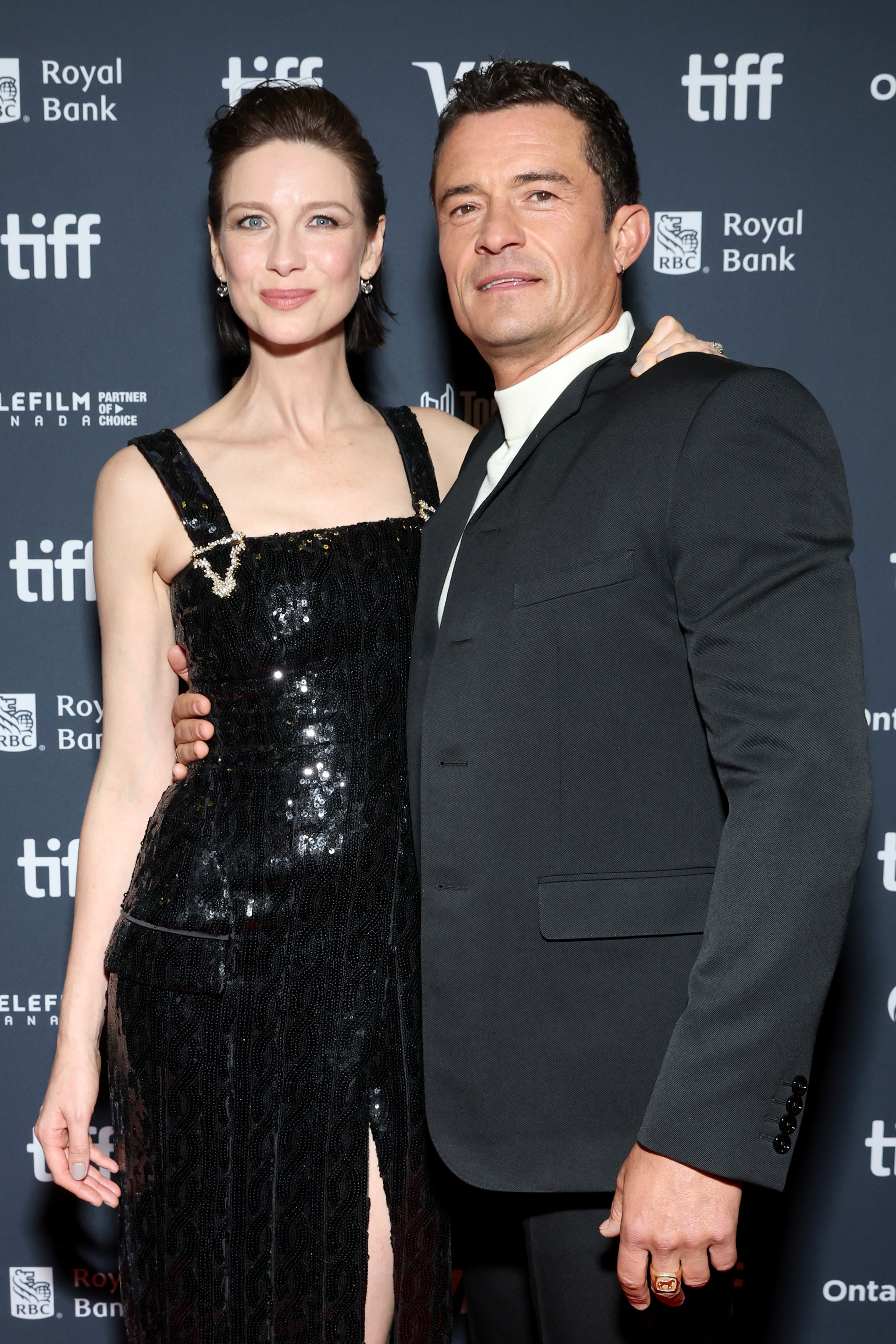 Orlando Bloom pictured with another woman during the premiere of "The Cut" during the Toronto International Film Festival on September 5, 2024 | Source: Getty Images