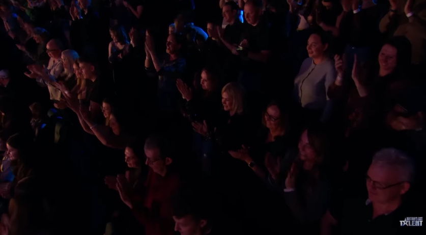 Audience members rise to their feet, applauding as the atmosphere inside the theatre reaches fever pitch. | Source: YouTube/Britain's Got Talent