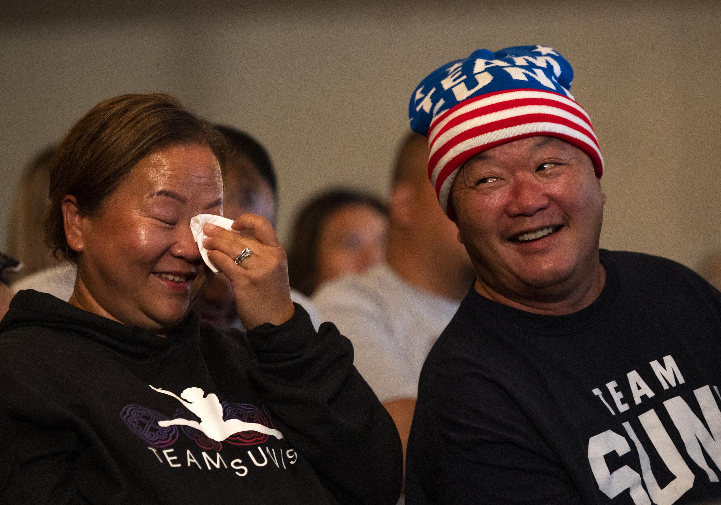 Yeev Thoj and John Lee react after Sunisa Lee competed on balance beam during the Women's All-Around Gymnastics Final at the Tokyo Olympic Games on July 29, 2021, in Oakdale, Minnesota | Source: Getty Images