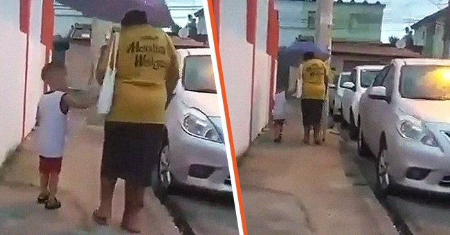 Four-year-old boy helping elderly woman walk in the rain. │Source: twitter.com/GoodNewsMoveme3