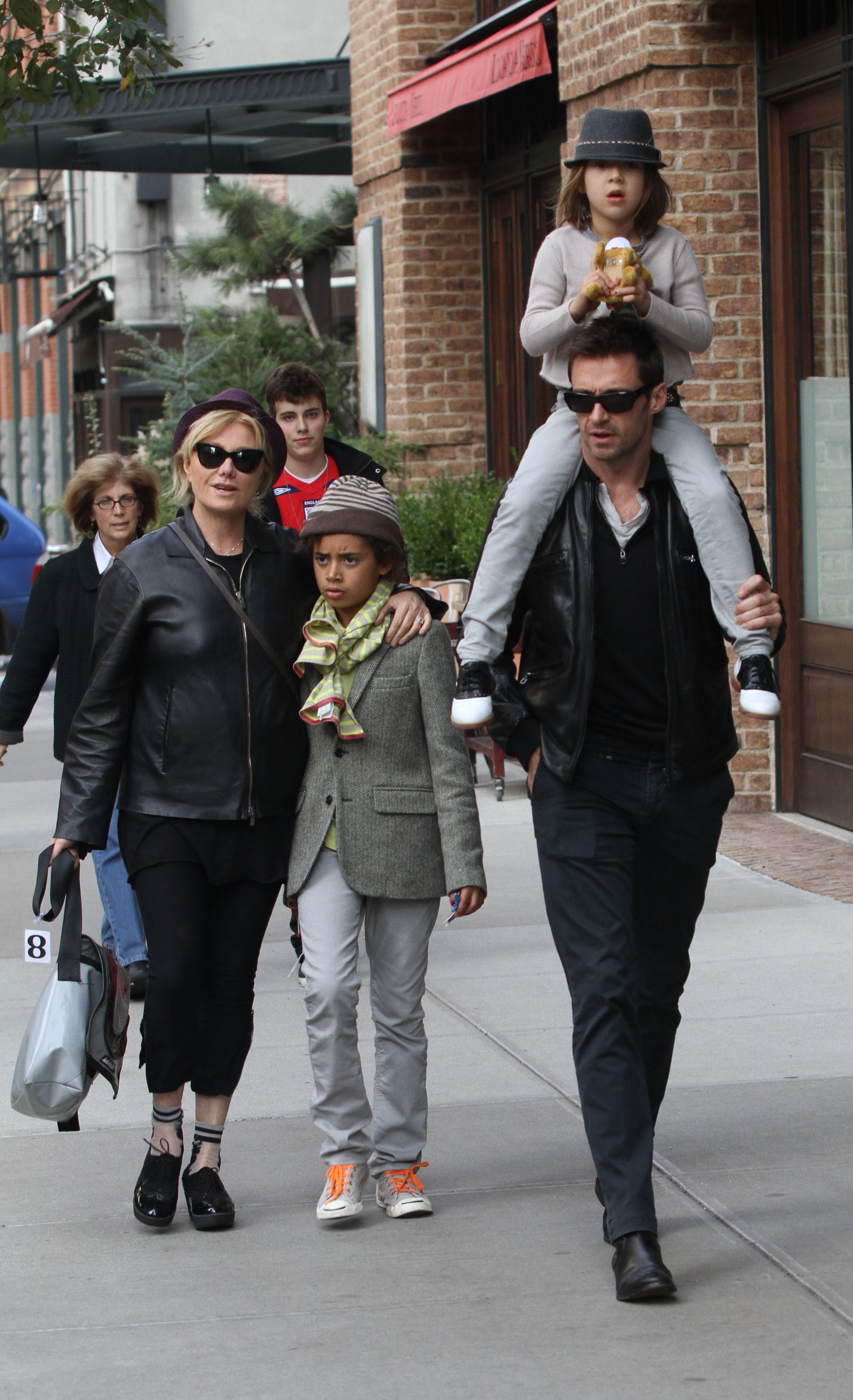 Deborra-Lee Furness, son Maximillian Jackman, daughter Ava Eliot Jackman and Hugh Jackman are seen arriving at Laughing Man Marketplace in Manhattan in New York City on October 23, 2011. | Source: Getty Images
