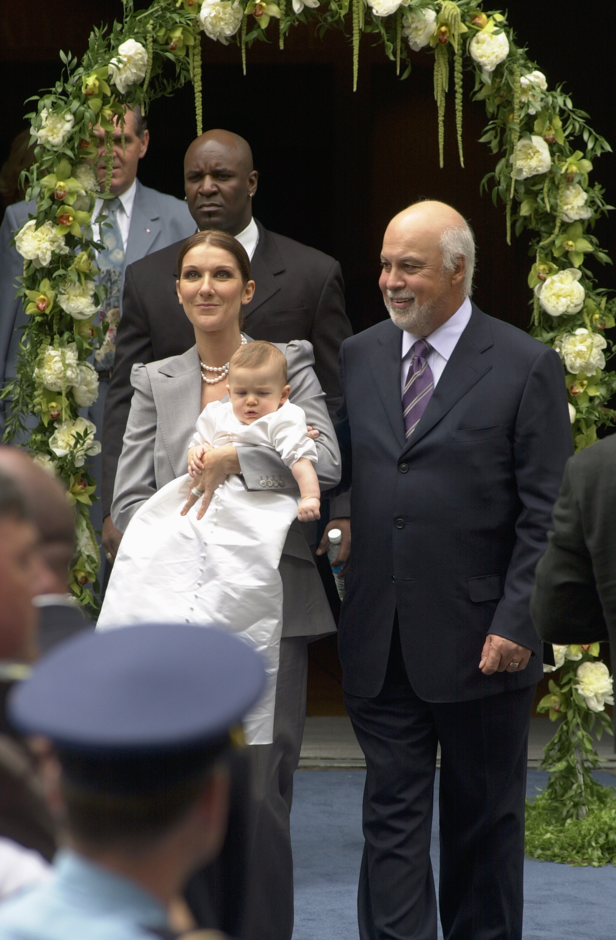 Celine Dion, Rene-Charles and Rene Angelil pictured leaving the chapel of the Notre-Dame Basilica in Montreal, Canada on July 25, 2001 | Source: Getty Images