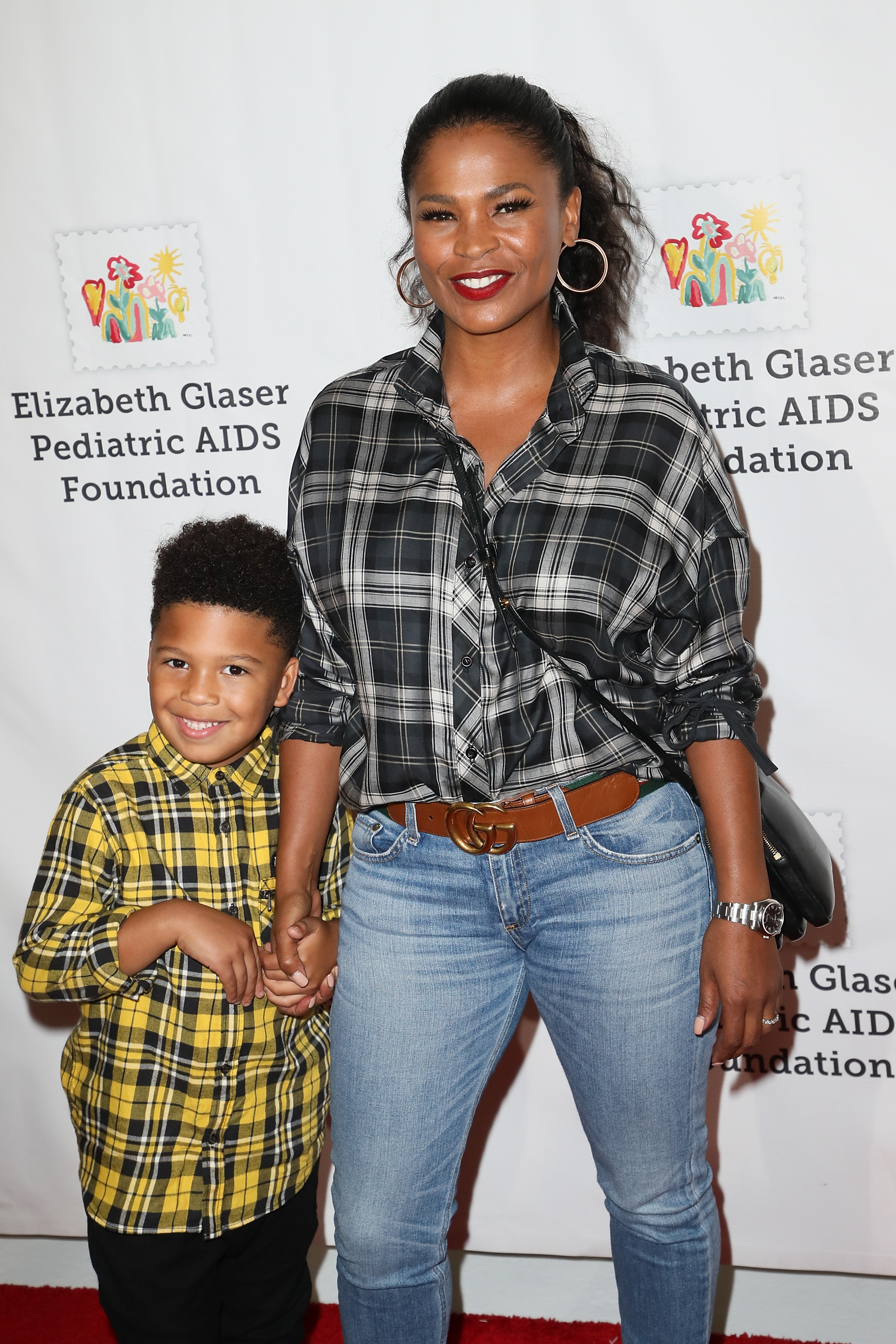 Nia Long and Kez Sunday Udoka at the Elizabeth Glaser Pediatric AIDS Foundation's 28th Annual "A Time For Heroes" Family Festival at Smashbox Studios on October 29, 2017 in Culver City, California. | Source: Getty Images
