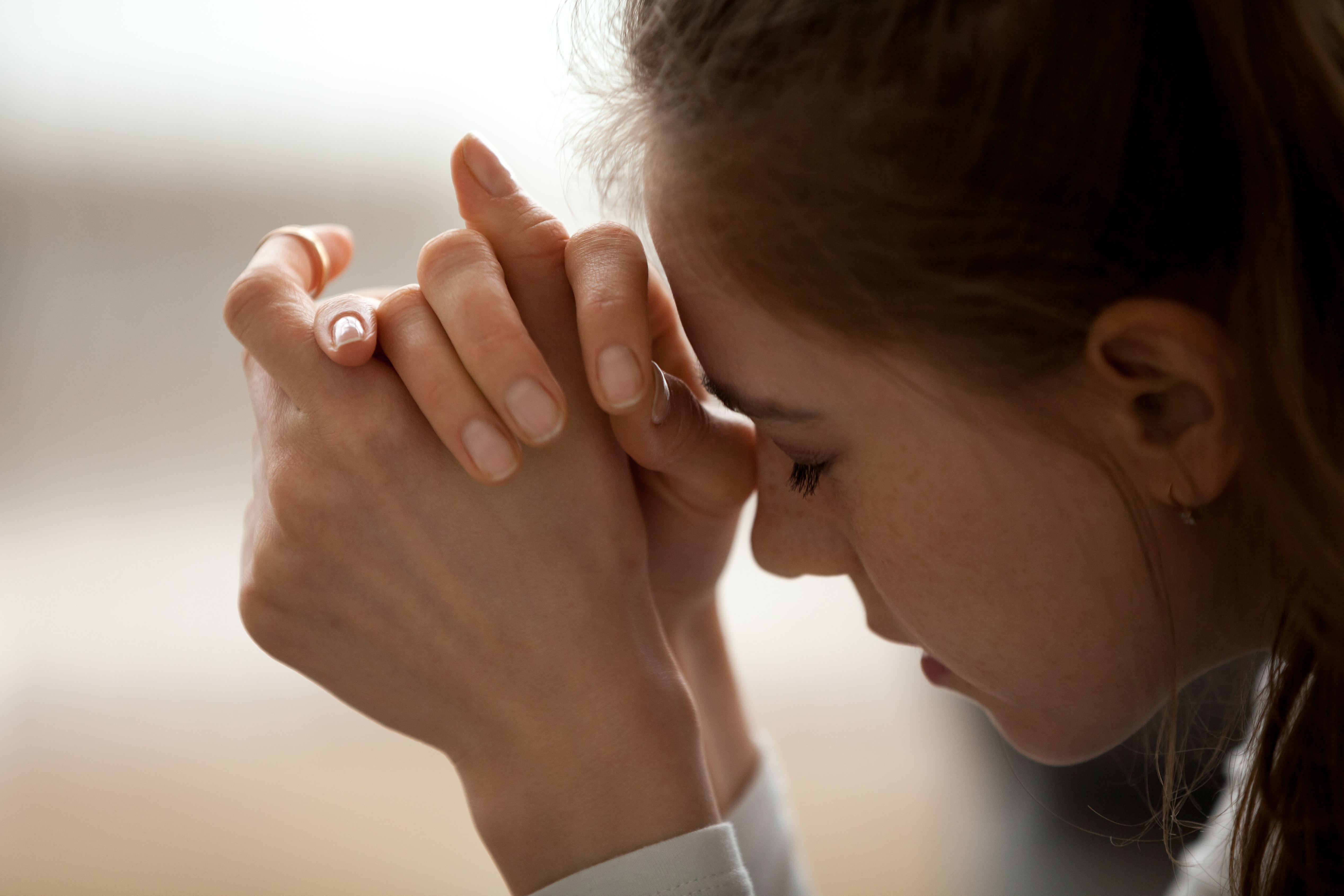 Close up of upset woman | Source: Shutterstock