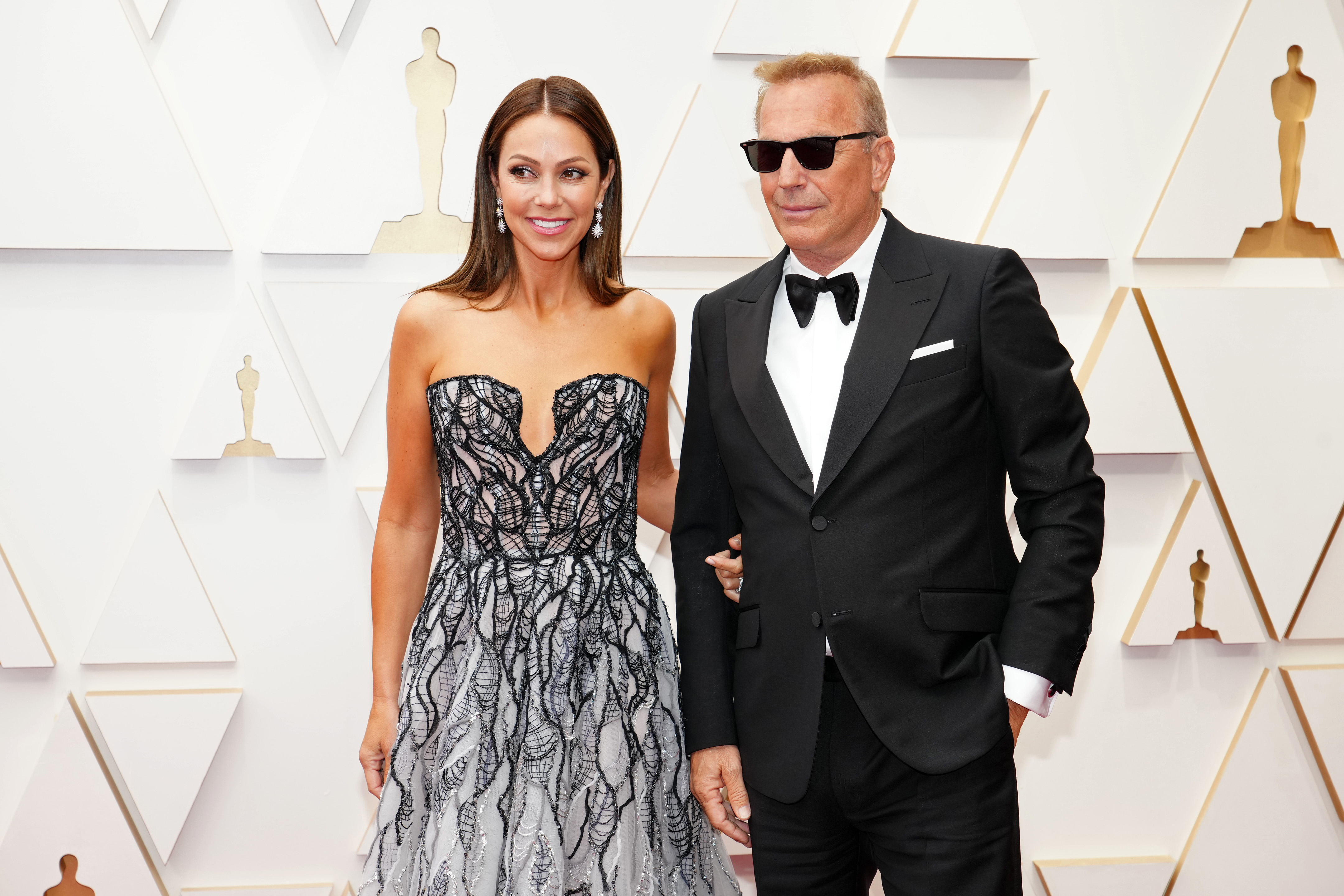 Christine Baumgartner and Kevin Costner in Hollywood, California on March 27, 2022 | Source: Getty Images
