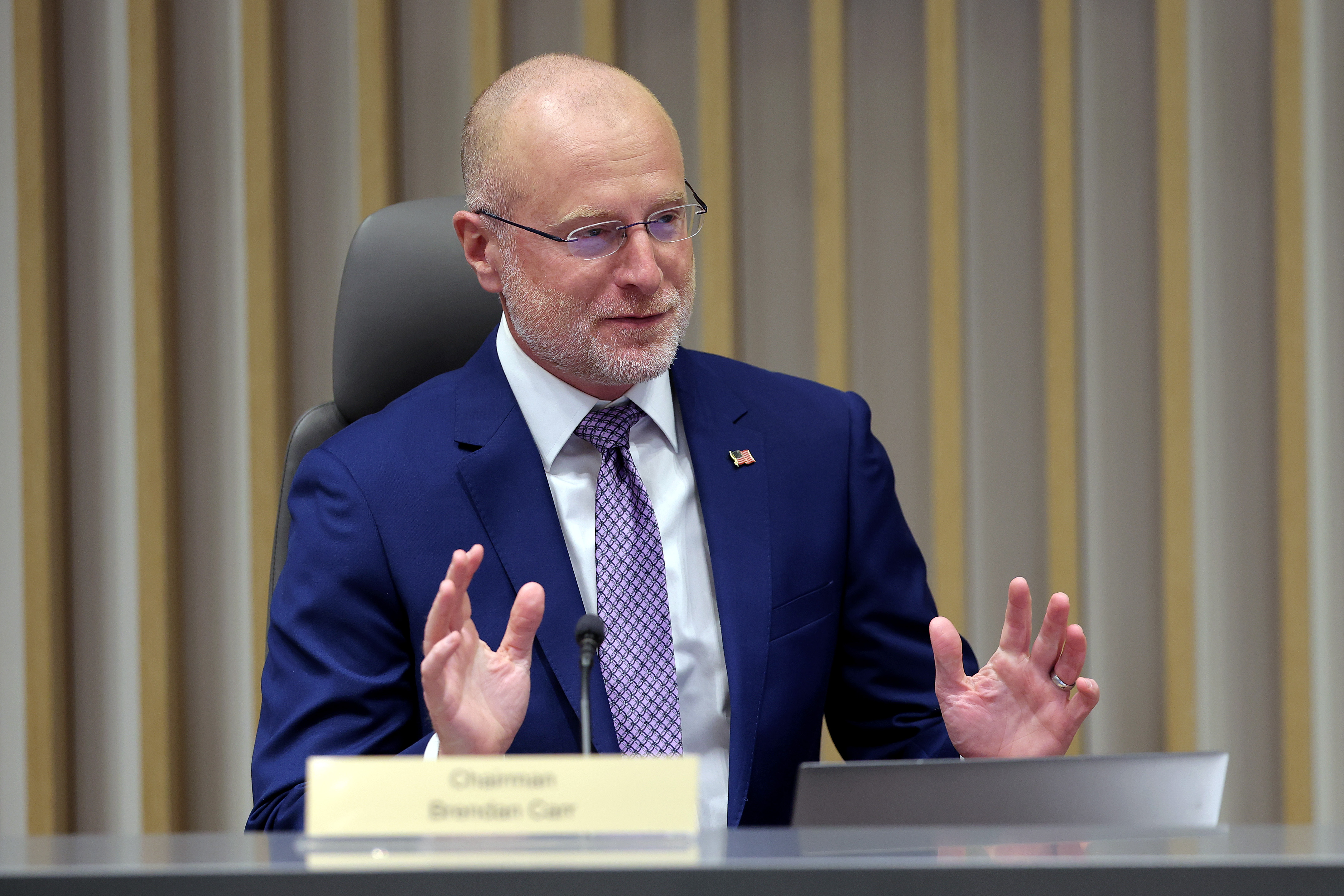 Brendan Carr participates in a FCC meeting at the Federal Communications Commission headquarters on February 18, 2026 in Washington, DC | Source: Getty Images