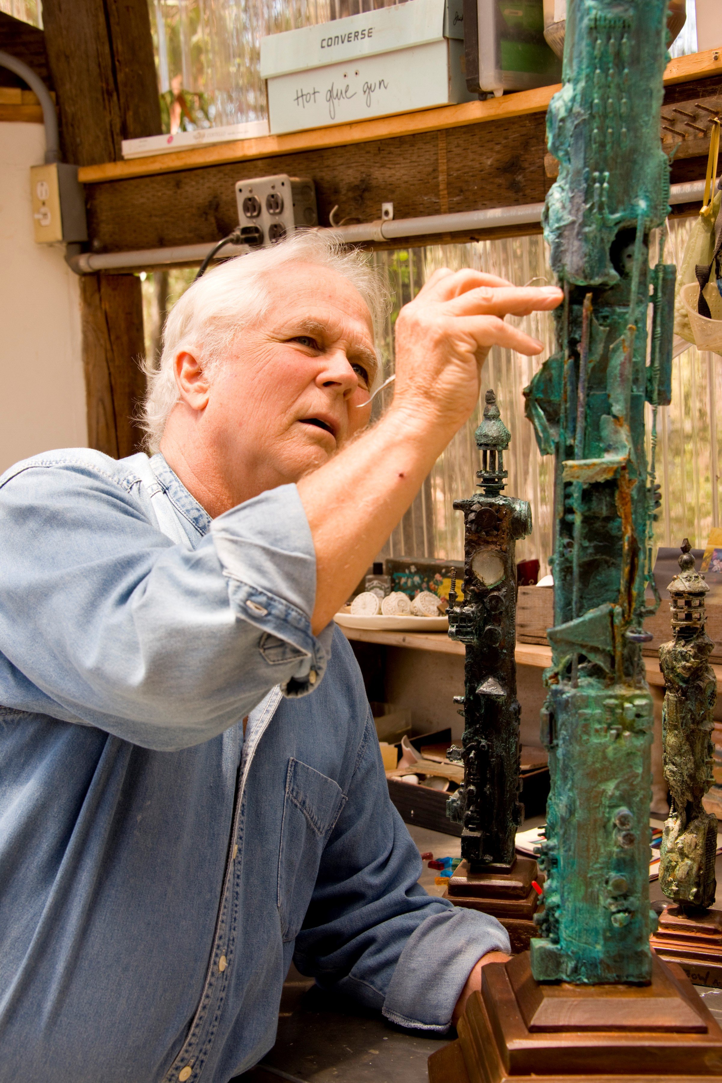 Actor and artist Tony Dow works on a sculpture in his studio on June 29, 2014 in Topanga, California. | Source: Getty Images