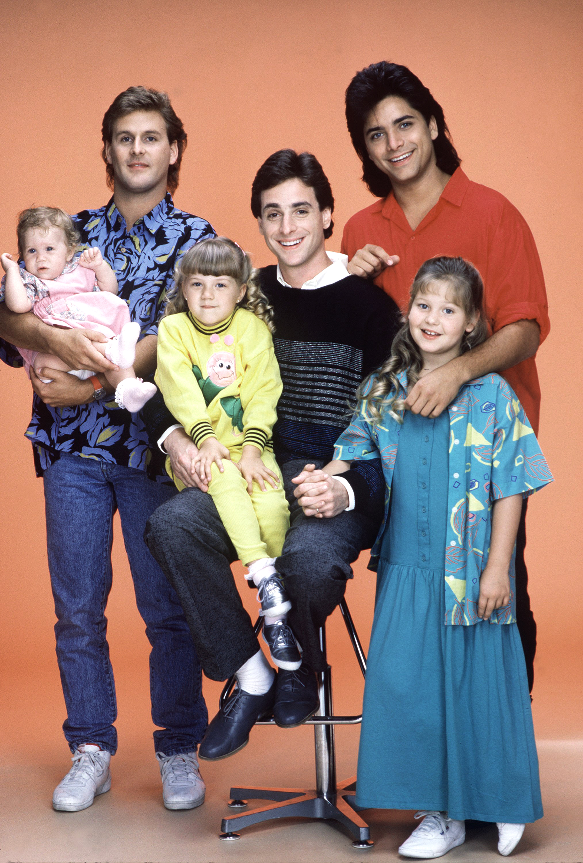 The little girl with the "Full House" cast photographed in 1987 | Source: Getty Images