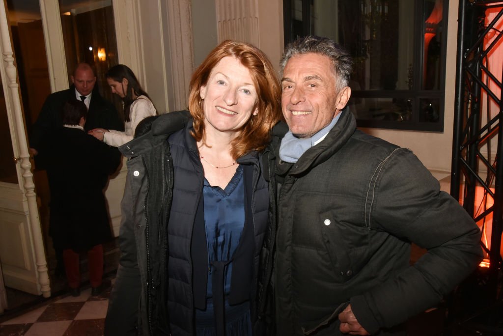 Gerard Holzet son épouse Muriel Mayette assistent au "Flair Group". | Photo : Getty Images