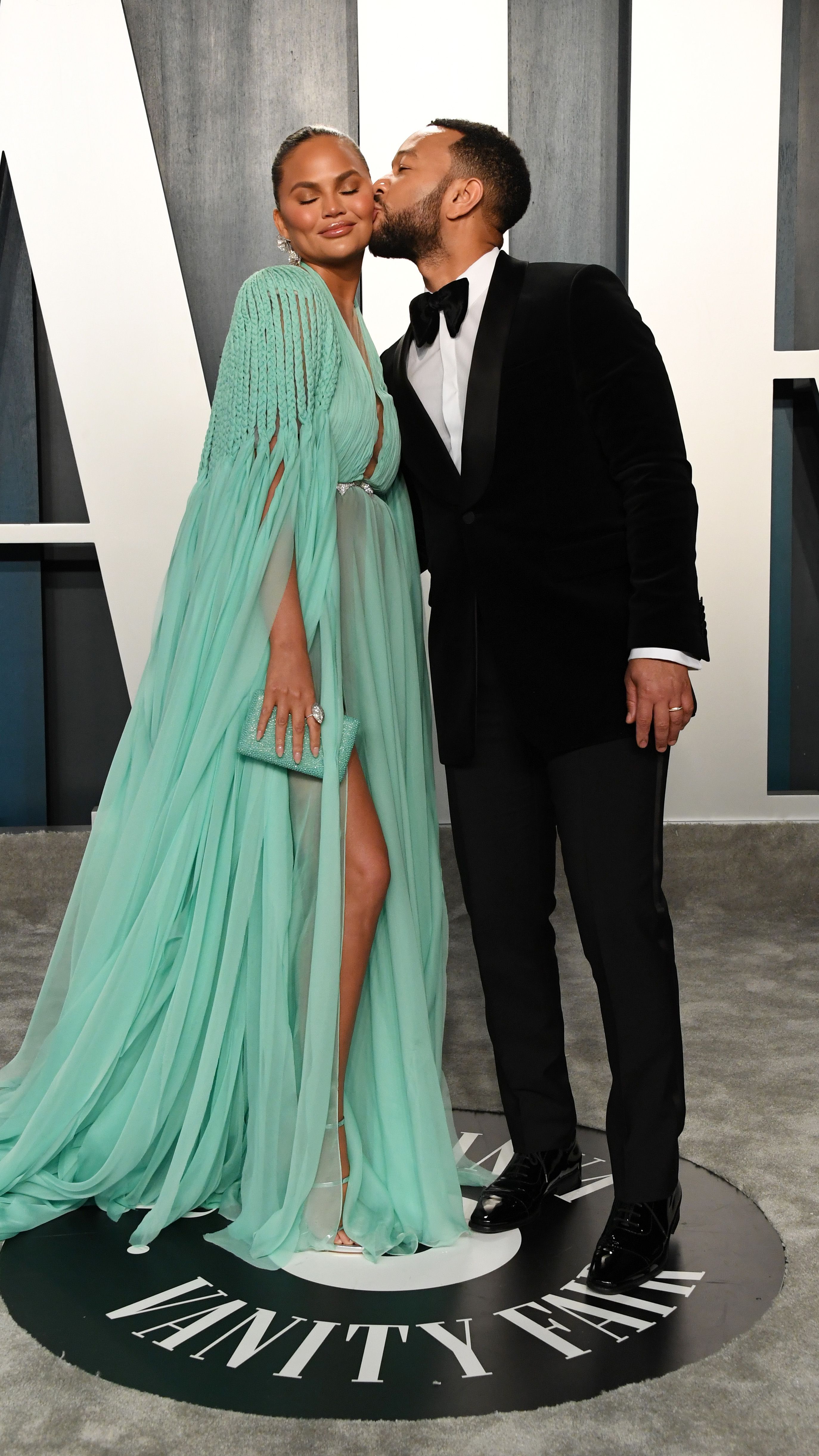 Chrissy Teigen and John Legend at the Vanity Fair Oscar party| Photo: Getty Images