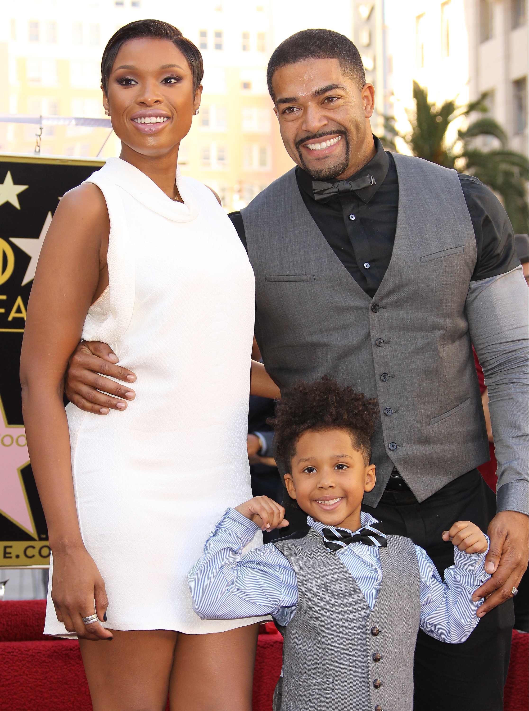 Jennifer Hudson poses with David Daniel Otunga, Sr., David Daniel Otunga Jr as she is honored with a Star on The Hollywood Walk of Fame in California  on November 13, 2013. | Source: Getty Images