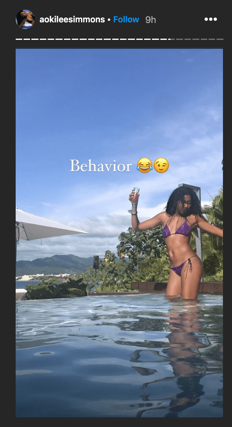 Aoki Lee Simmons posing poolside in a bikini for her 18th birthday | Source: Instagram.com/kimoraleesimmons