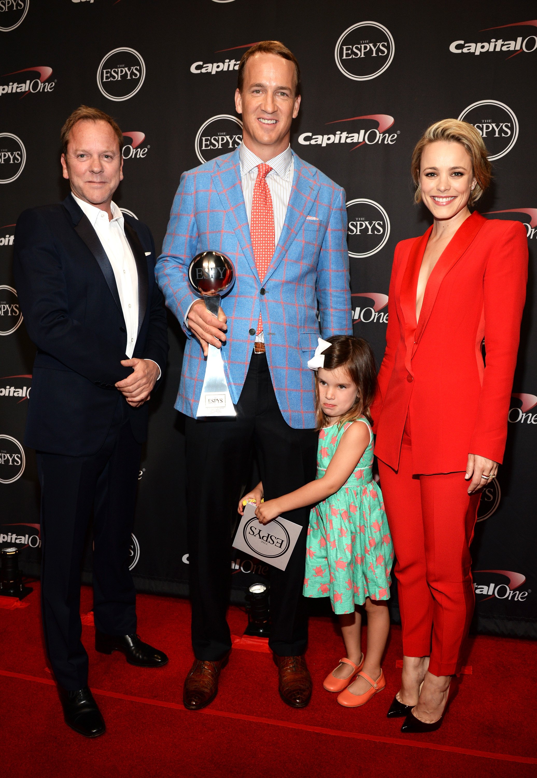 Actor Kiefer Sutherland, NFL player Peyton Manning with his daughter Mosley Thompson Manning and actress Rachel McAdams attend The 2015 ESPYS at Microsoft Theater on July 15, 2015, in Los Angeles, California. | Source: Getty Images