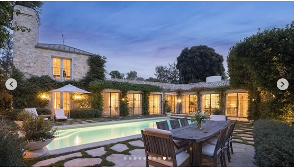 A view of the pool area in Ben Affleck's new home, from a post dated August 5, 2024 | Source: Instagram/robbreportrealestate