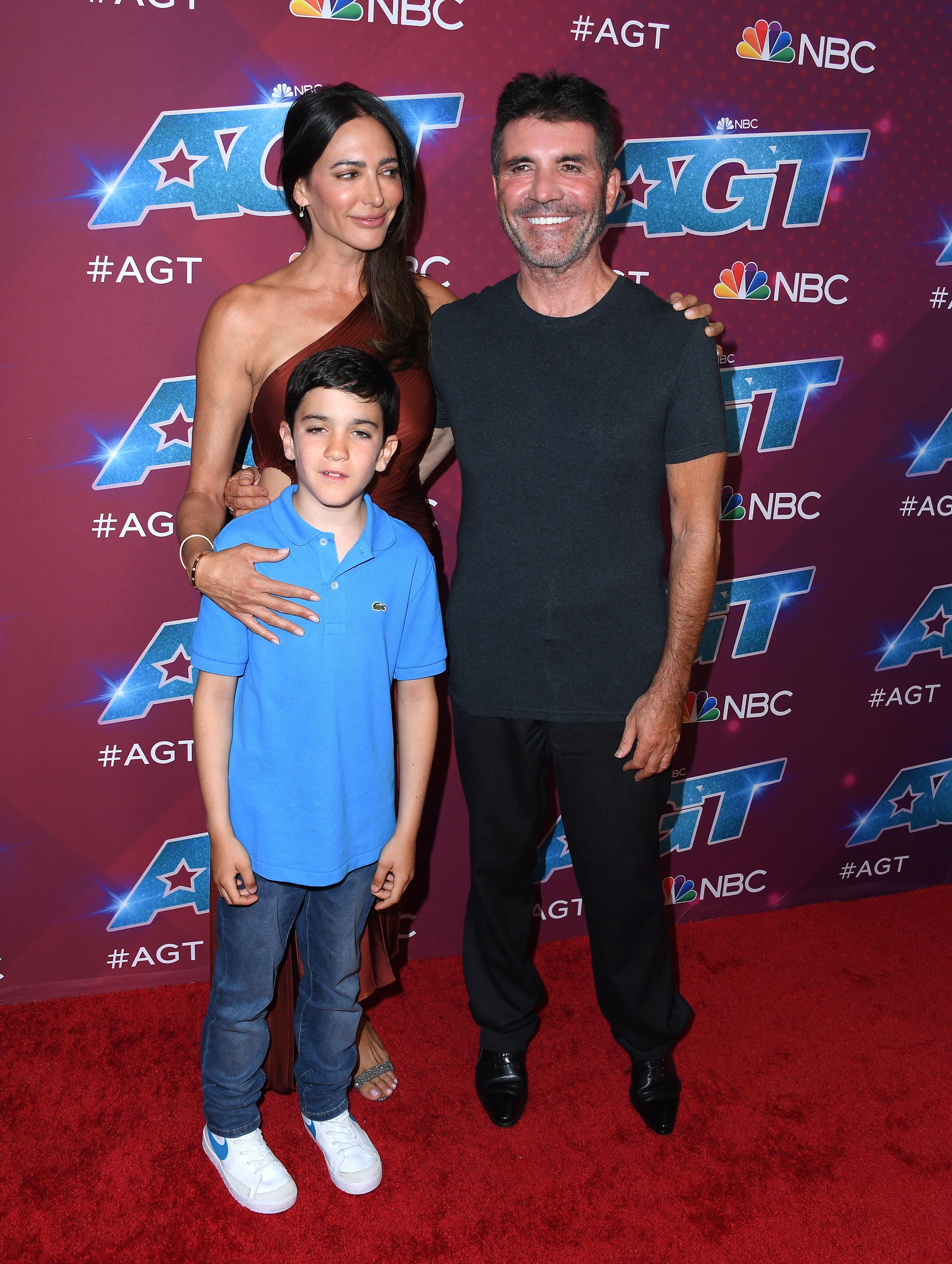 Lauren Silverman, Eric Cowell, and Simon Cowell on the red carpet for "America's Got Talent" season 17 Live Show on September 13, 2022, in Pasadena, California | Source: Getty Images