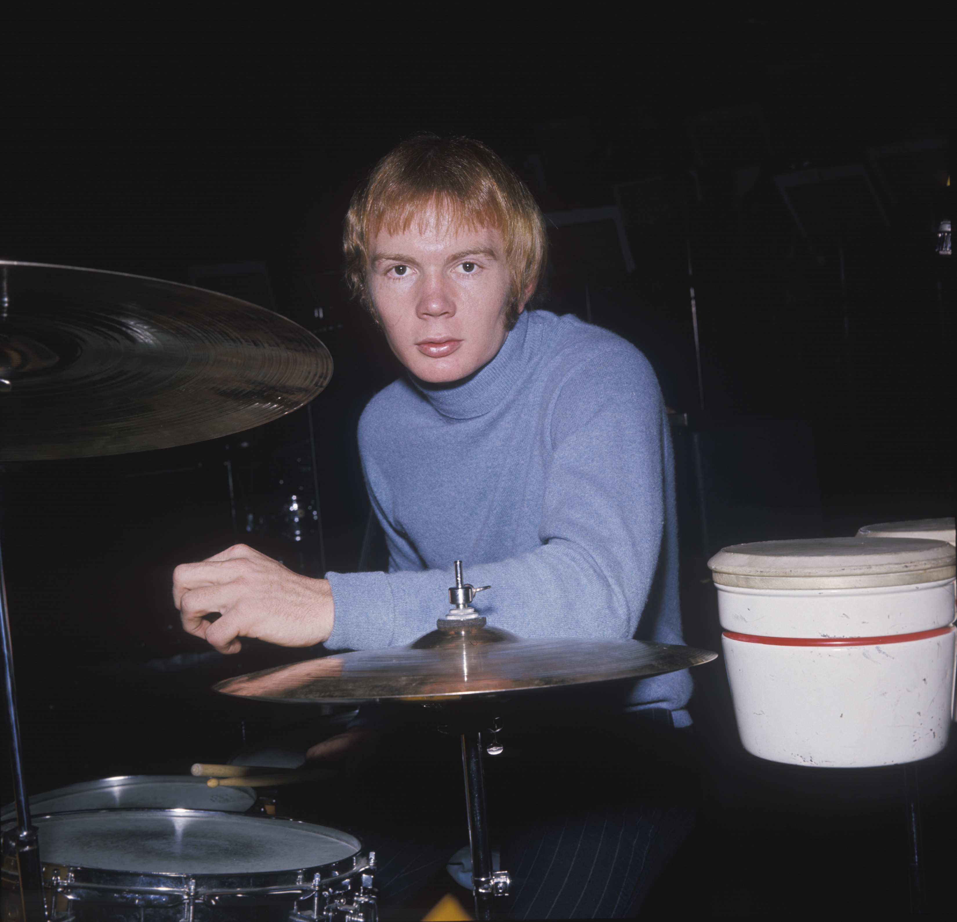 Australian drummer Colin Petersen seated at a drum kit in London in March 1968 | Source: Getty Images