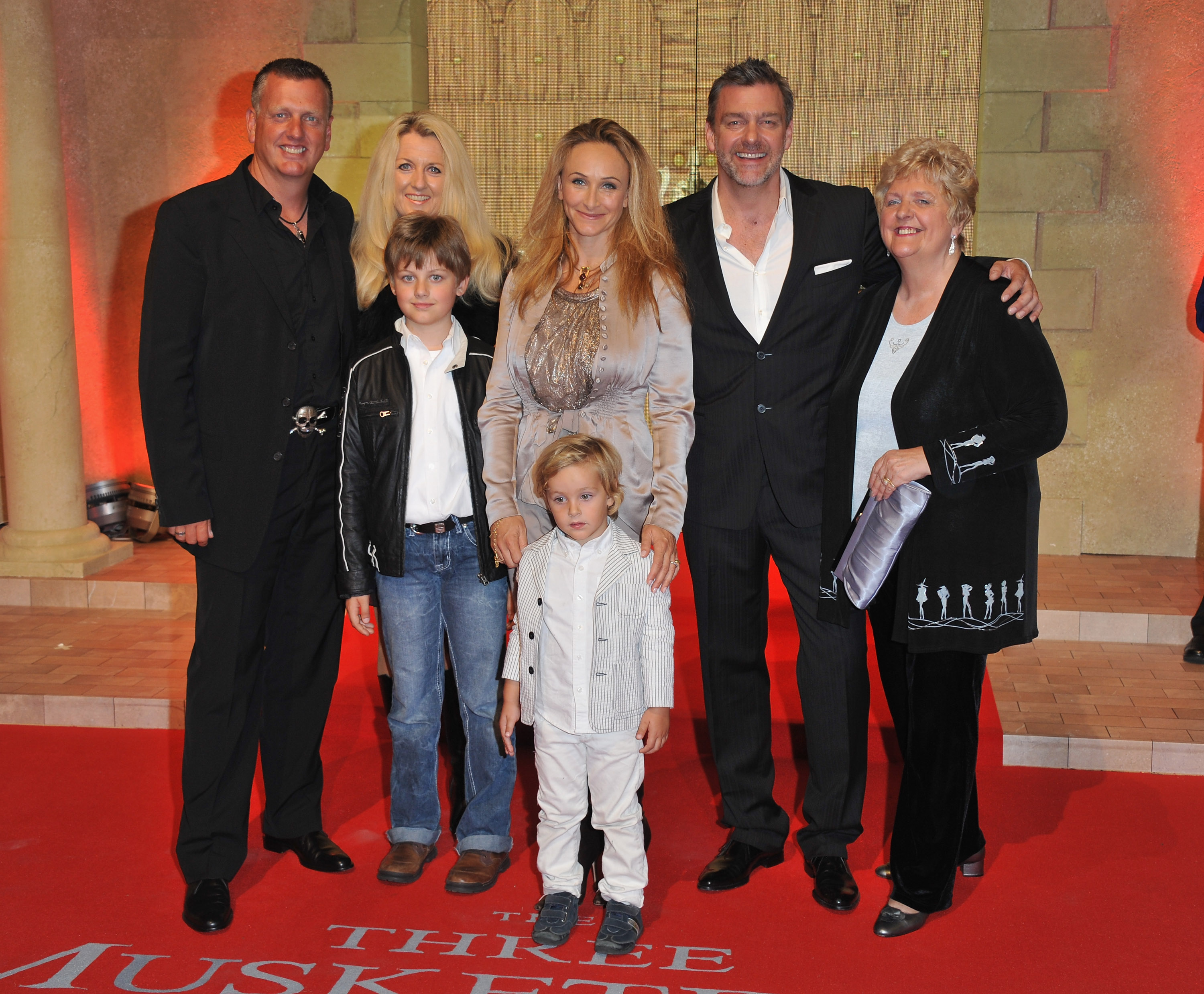 Ray Stevenson and Elisabetta Caraccia and family arrive at the "Three Musketeers in 3D" world premiere at Vue Westfield, on October 4, 2011, in London, England. | Source: Getty Images