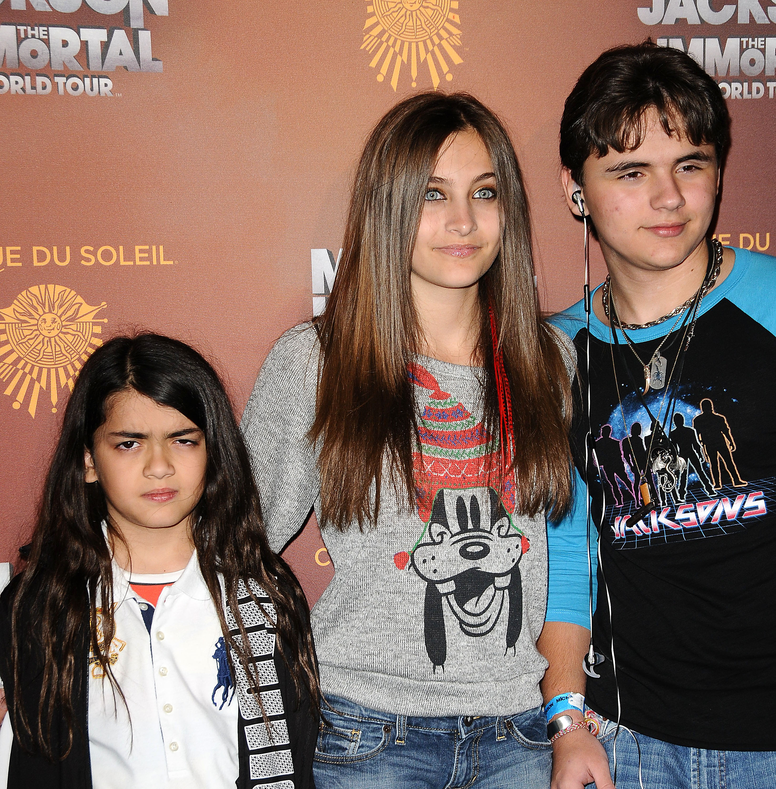 Prince Michael Jackson II, Paris Jackson, and Prince Jackson at the Los Angeles opening of "Michael Jackson THE IMMORTAL World Tour" on January 27, 2012. | Source: Getty Images