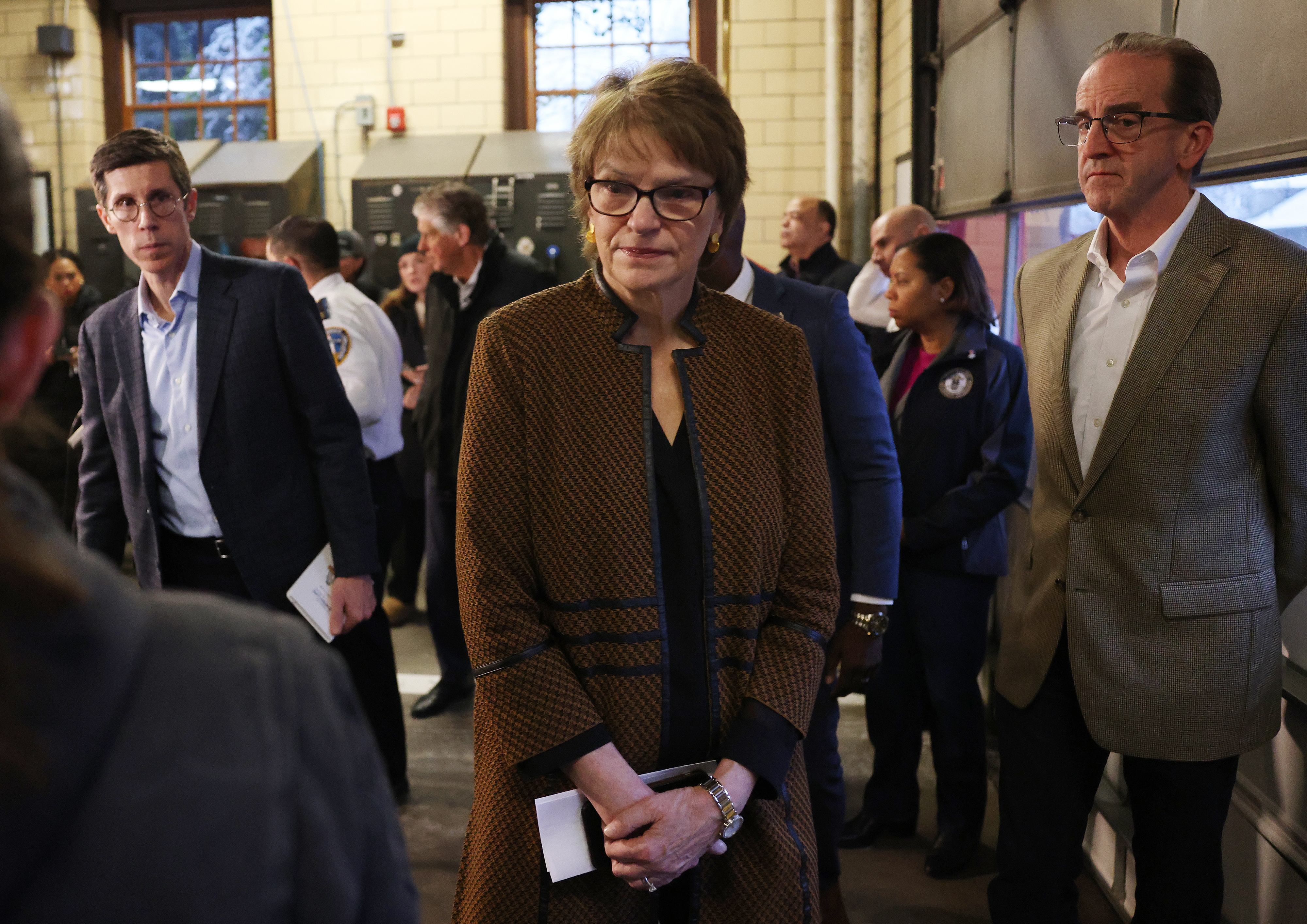 Brown University President Christina H. Paxson leaves a press conference held to announce that a person of interest is in custody in connection with the Brown University shooting on December 14, 2025 | Source: Getty Images
