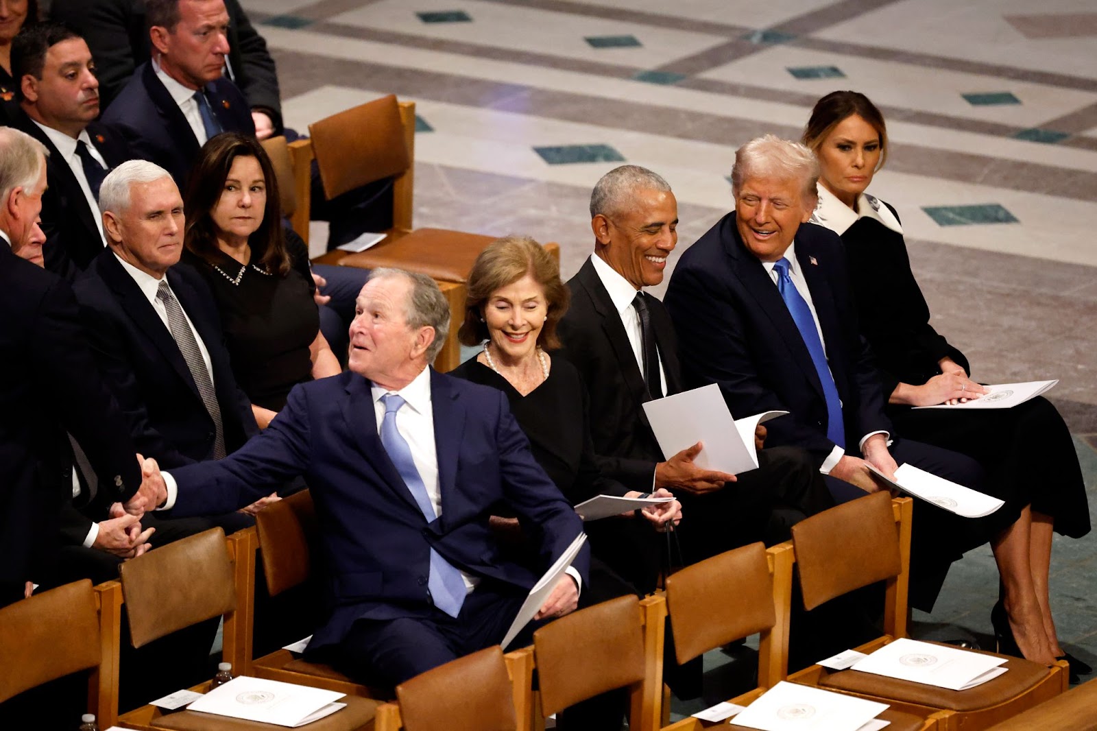 Former U.S. presidents, including George W. Bush, Barack Obama, and President Donald Trump, at the state funeral for former U.S. President Jimmy Carter with their respective wives, Laura Bush and Melania Trump | Source: Getty Images