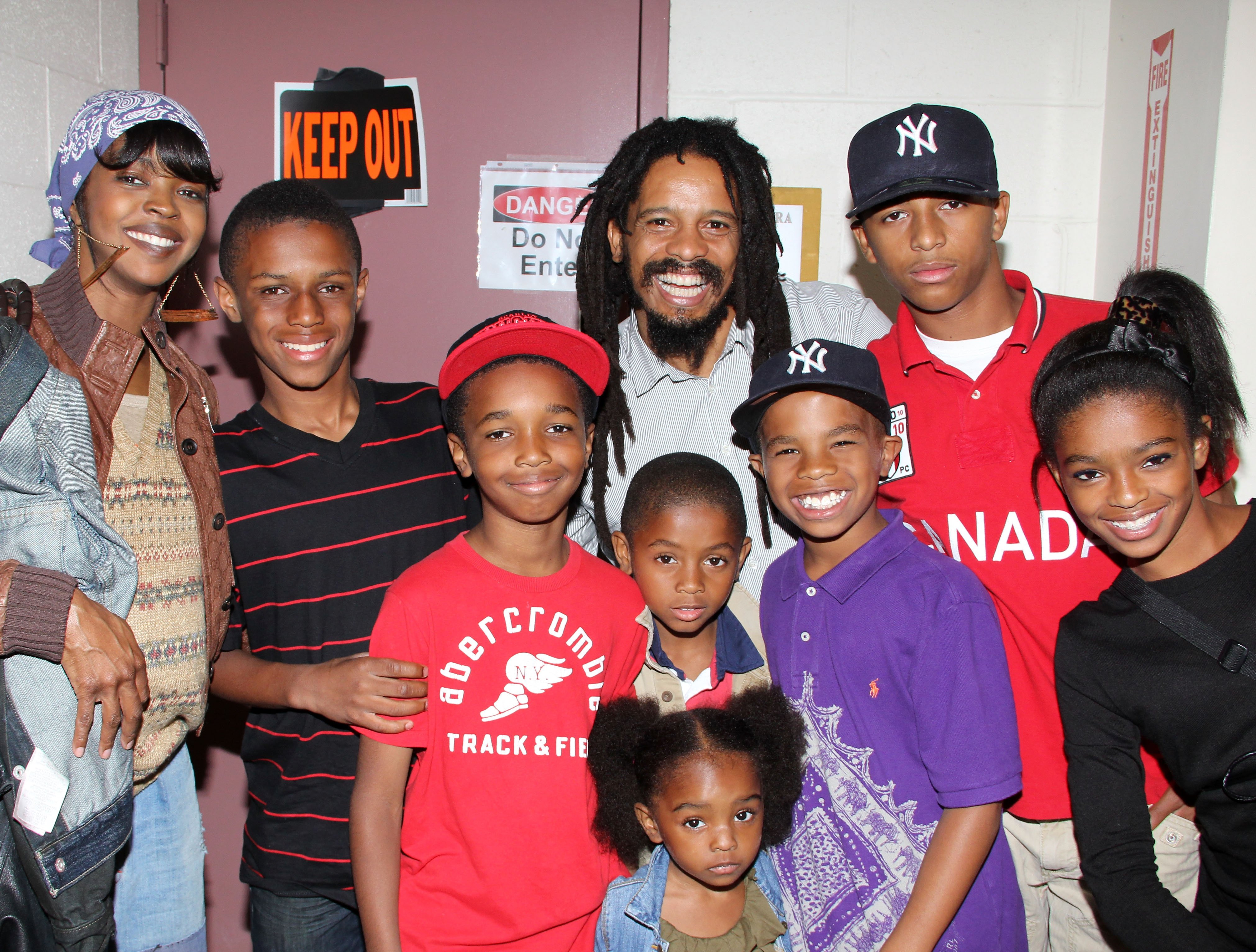 Lauryn Hill, Rohan Marley and family pose backstage at "Spider-Man: Turn Off The Dark" on Broadway at The Foxwoods Theater on June 28, 2011 in New York City. | Source: Getty Images