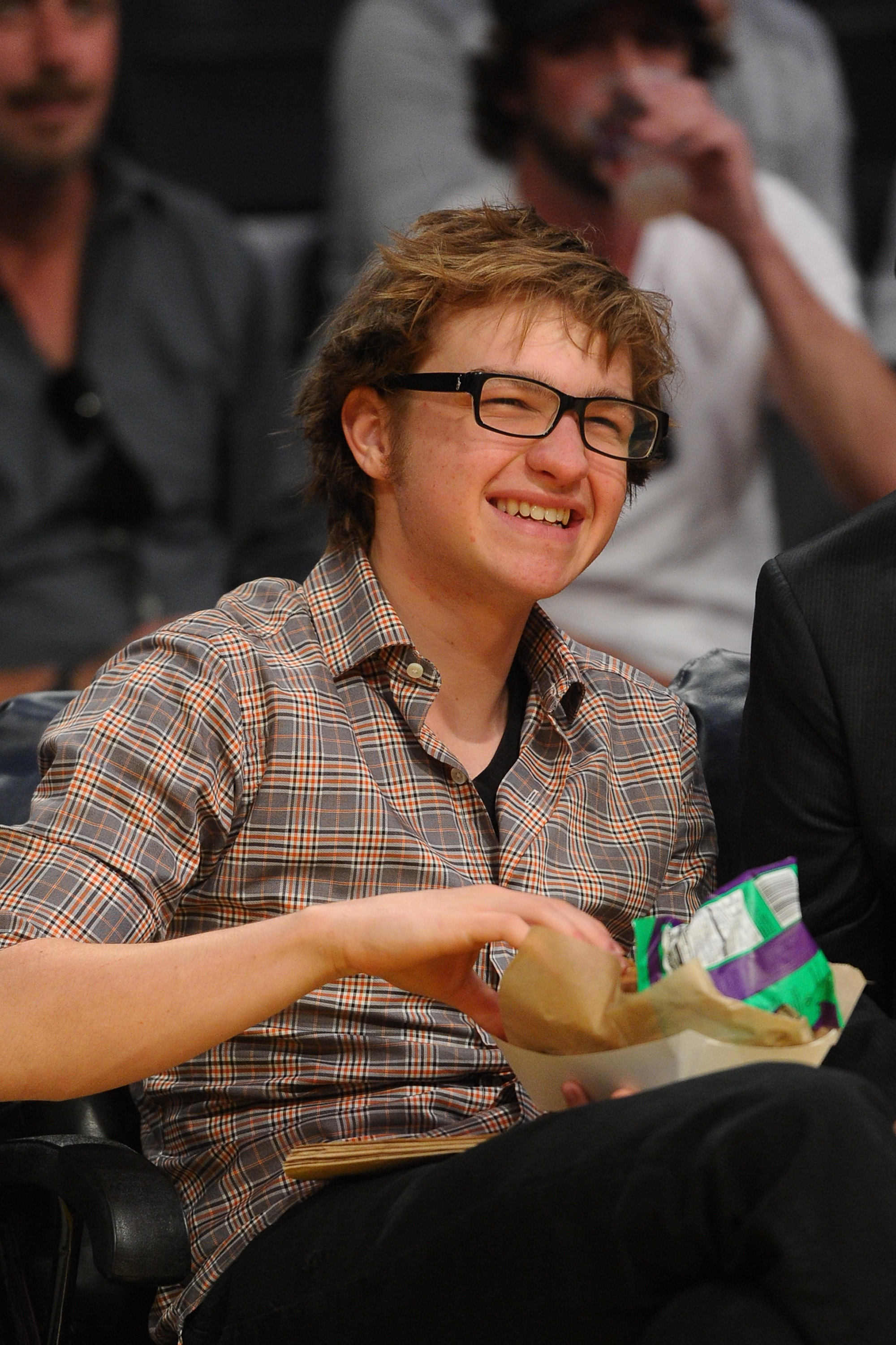 Angus T. Jones at a basketball game in Los Angeles in 2011 | Source: Getty Images
