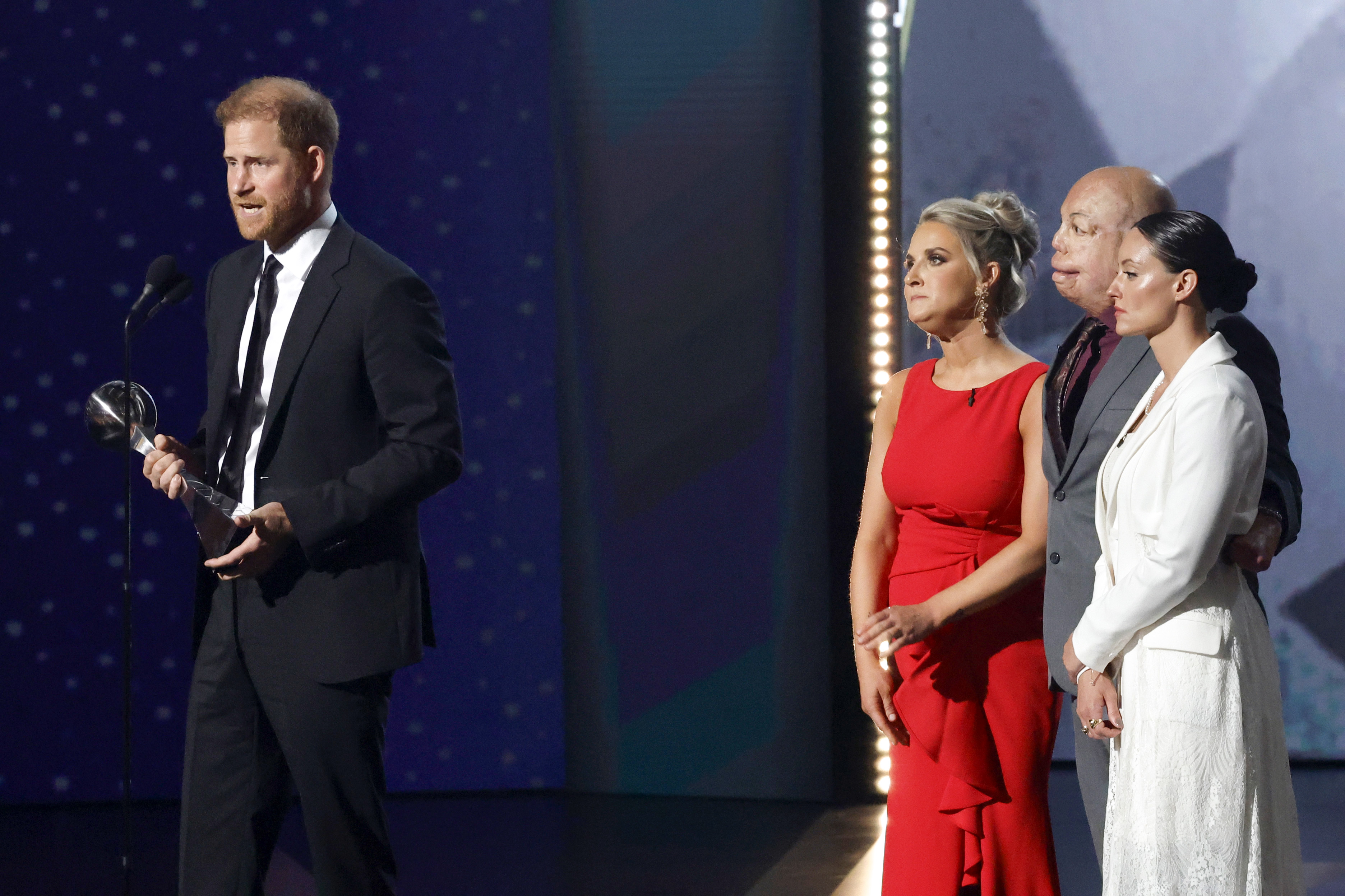 Prince Harry gave a speech after accepting the Pat Tillman Award onstage from Kirstie Ennis, Israel Del Toro, and Elizabeth Marks during the ESPY Awards on July 11, 2024 in Hollywood, California | Source: Getty Images