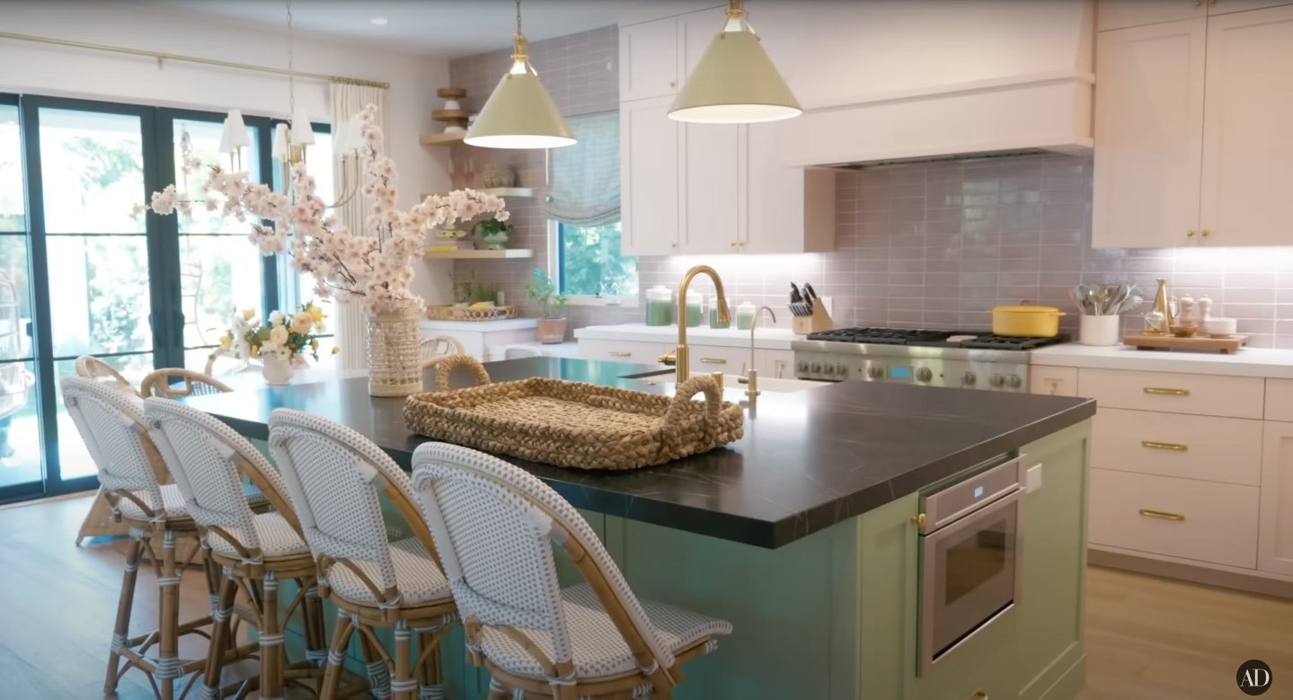 Bryce Howard and Seth Gabel's transformed kitchen featuring original pieces. / Source: YouTube.com/ArchitecturalDigest