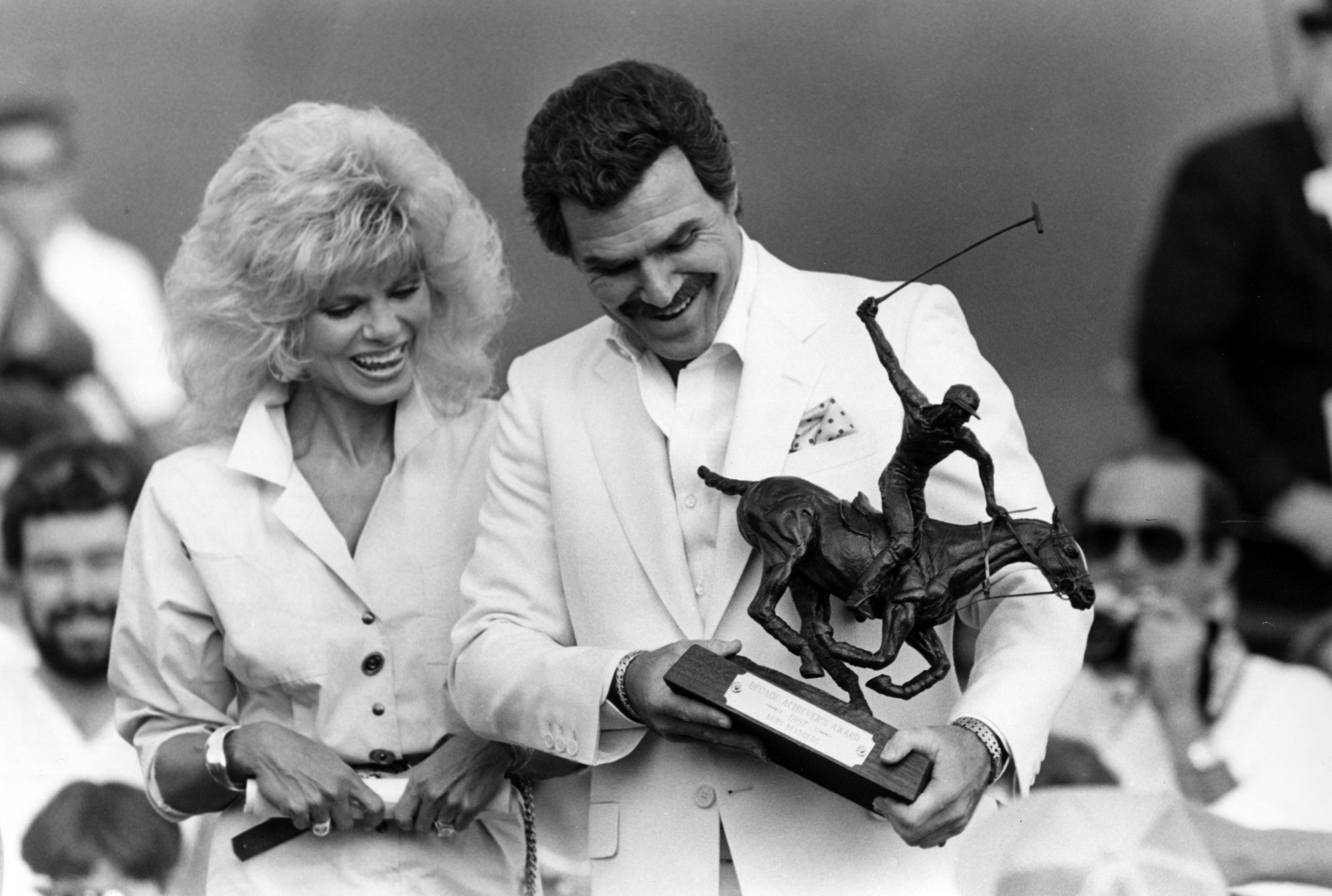 Burt Reynolds and Loni Anderson at Royal Palm Polo on March 15, 1987, in Boca Raton, Florida. | Source: Getty Images