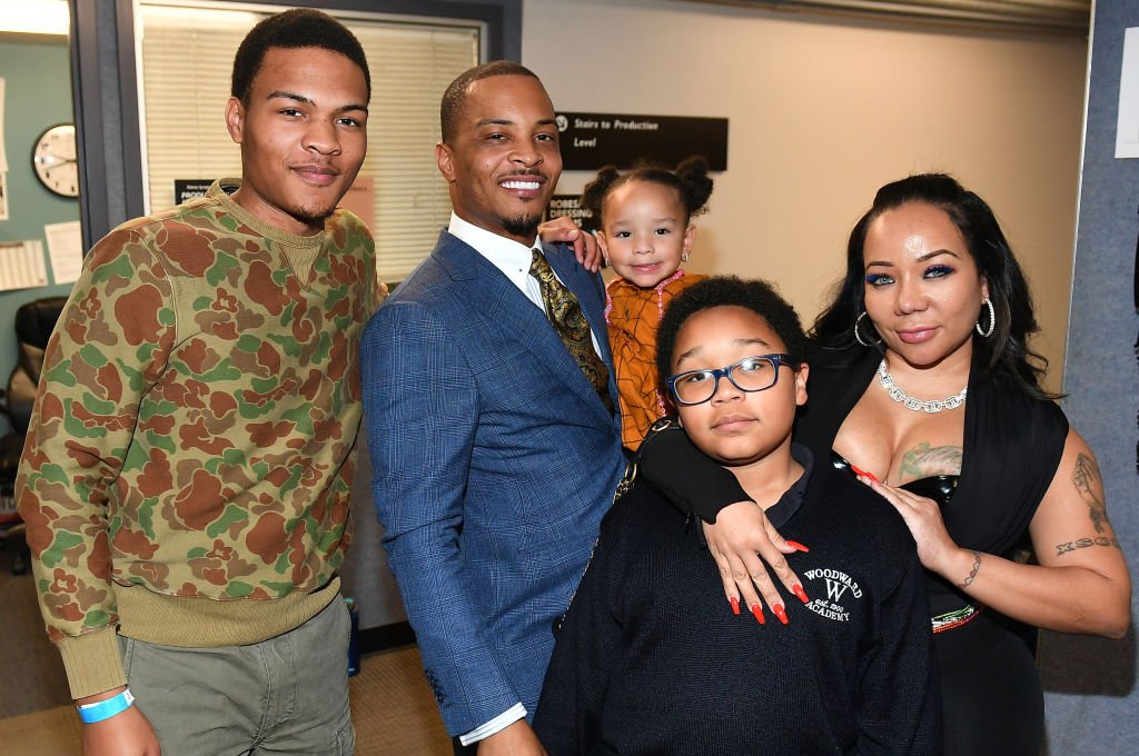 Messiah Harris, T.I., Heiress Diana Harris, Major Harris, and Tameka "Tiny" Harris pose backstage during the  "Between The World And Me" Atlanta premiere in 2019| Photo: Getty Images