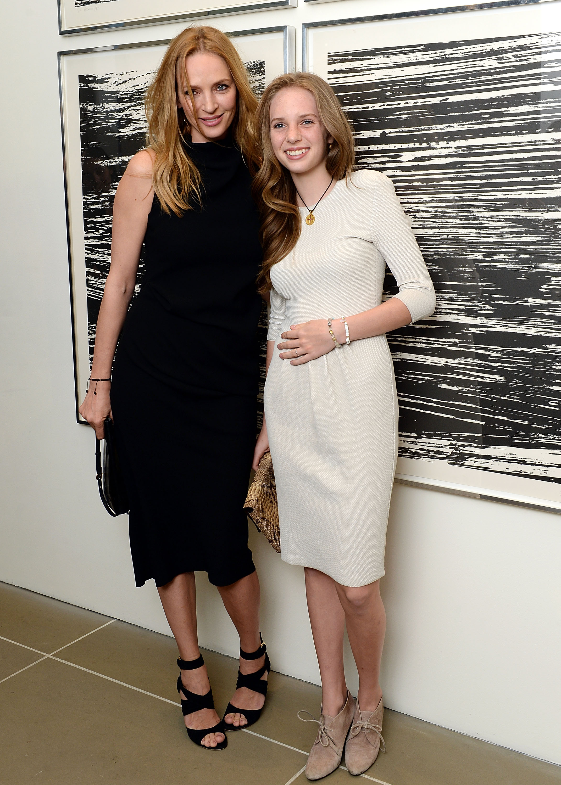 All grown up and already commanding the camera, Maya made a radiant red carpet debut alongside her mother. At the HRC Marriage for Equality USA celebration in 2013, she stunned in a soft cream dress and lace-up boots, effortlessly mirroring Uma's sleek black elegance. Arm-in-arm and glowing under gallery lights, Maya was beginning to make her own name.