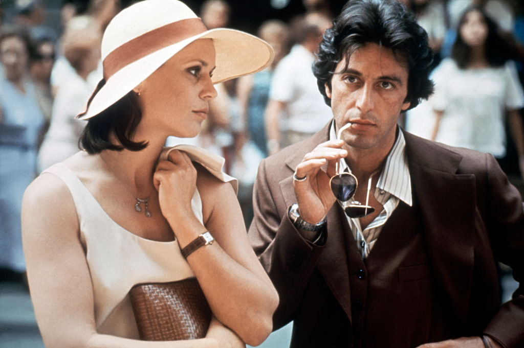 Swiss actress Marthe Keller and American actor Al Pacino on the set of Bobby Deerfield, directed by Sydney Pollack | Source: Getty Images