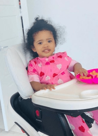 Photo of Ray J and Princess Love's daughter, Melody, sitting on a high baby chair. | Photo: Instagram/@princess Love